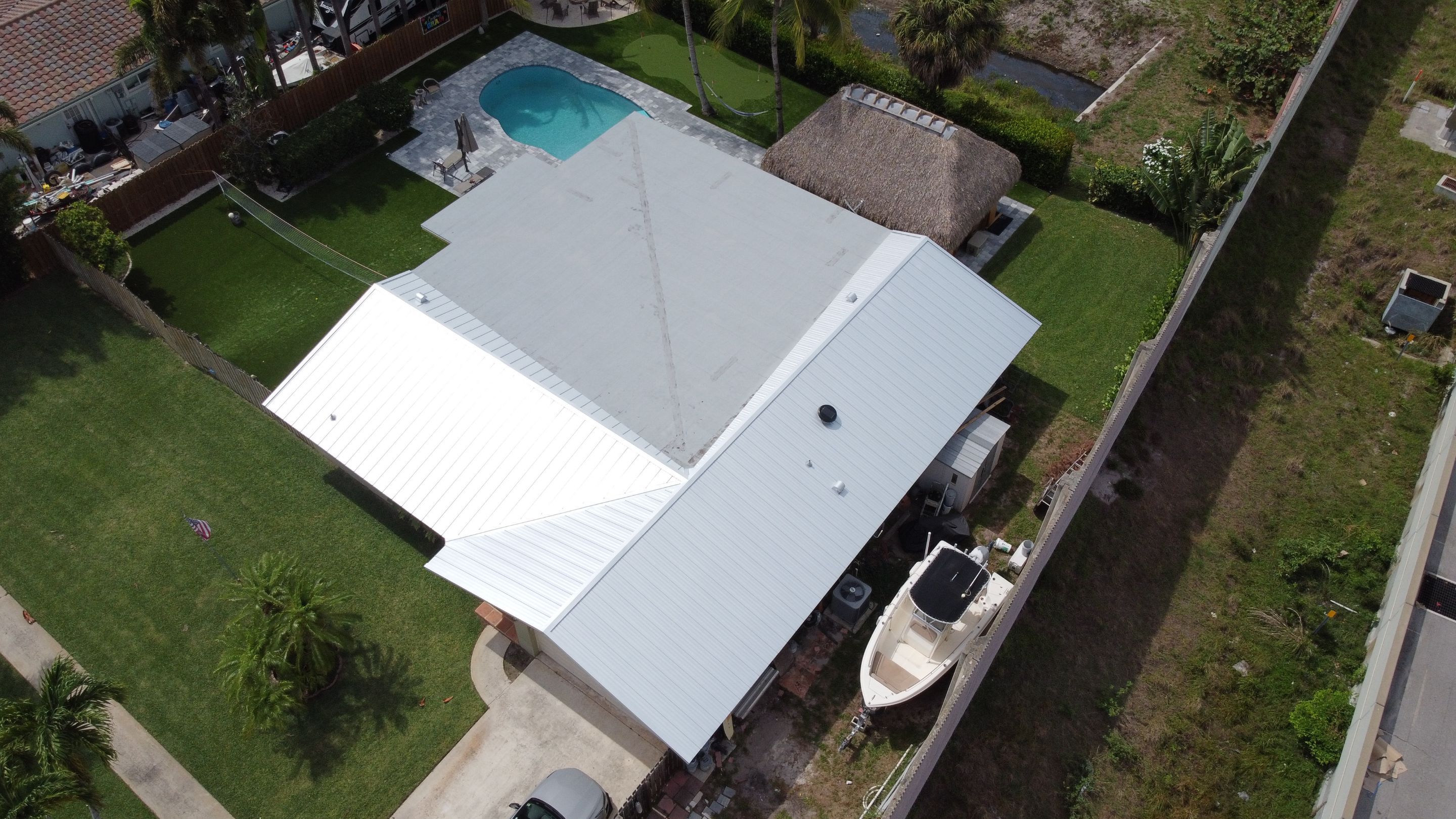 Residential Roofing Installation using 1" Nail strip metal roof by BLUES BROTHERS ROOFING