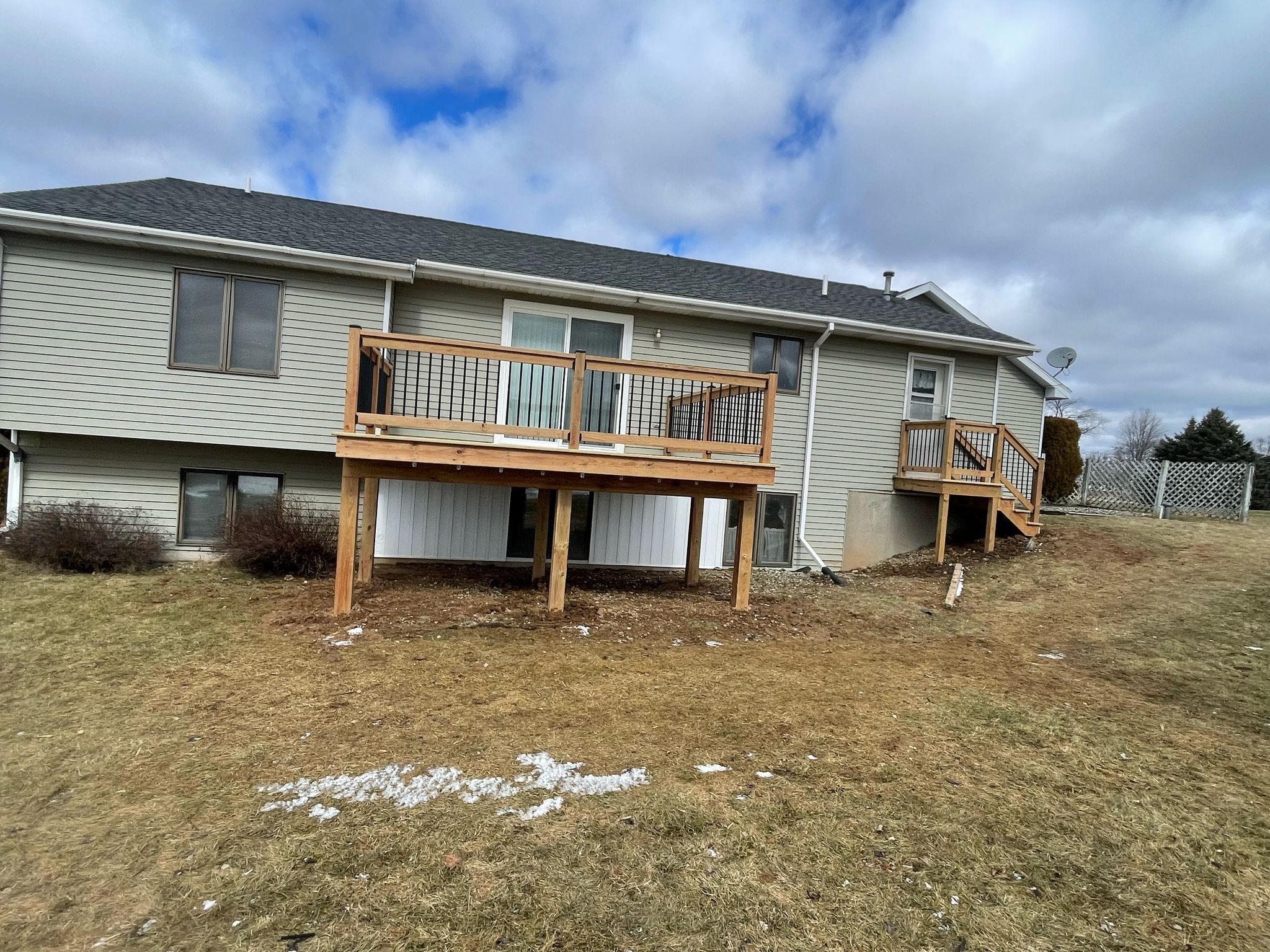 Deck Installation using Treated Lumber by Avalon Roofing and Exteriors