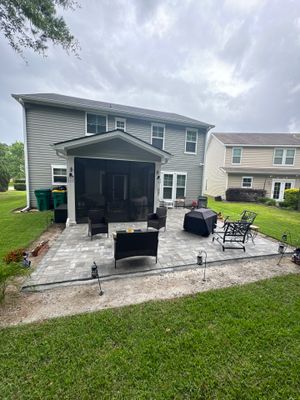 Custom Paver Patio Extension and Circular Fire Pit in Bluffton