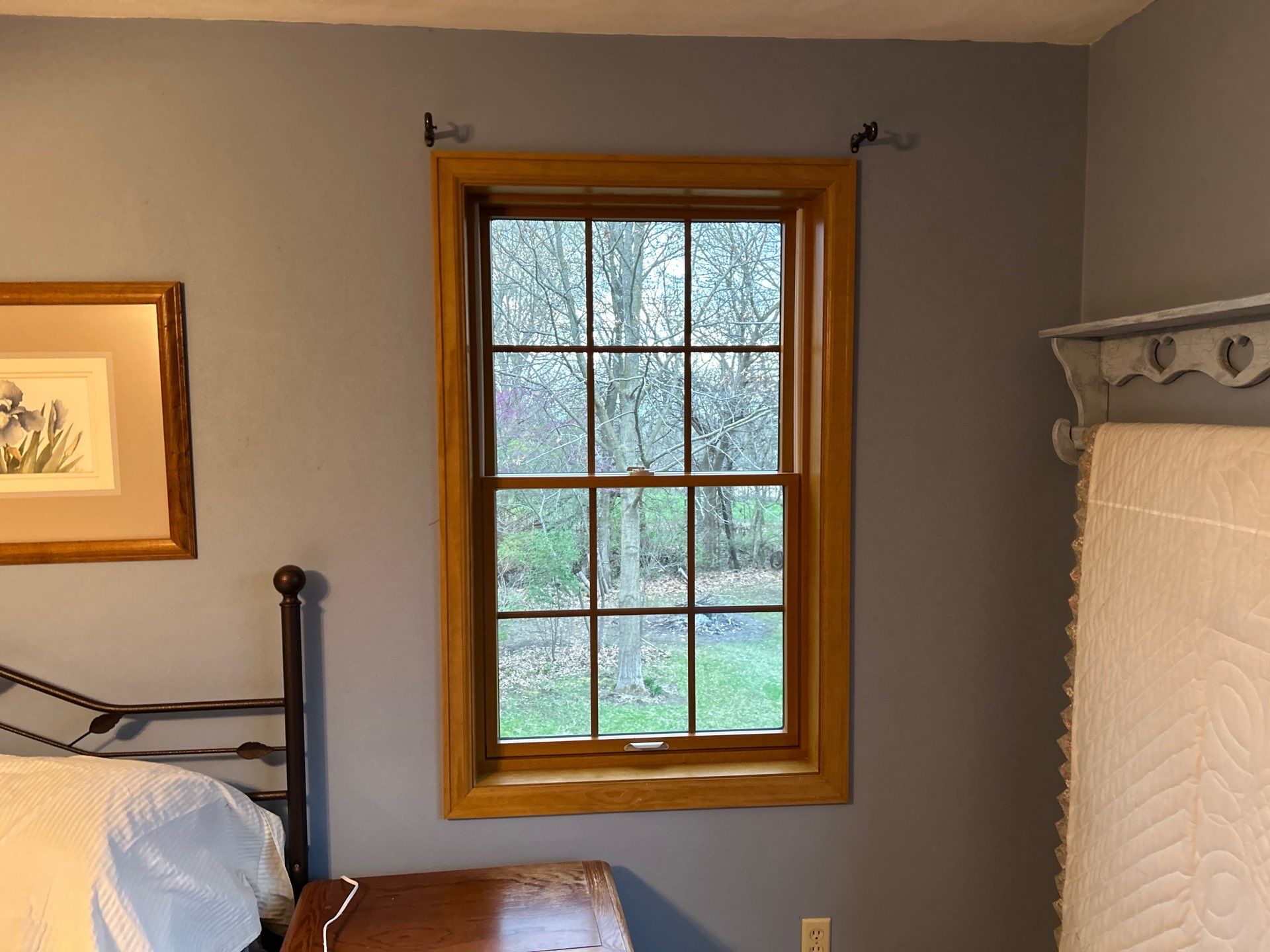 Pella Window installation using Pella Lifestyle wood/Aluminum window by United Windows and Siding LLC