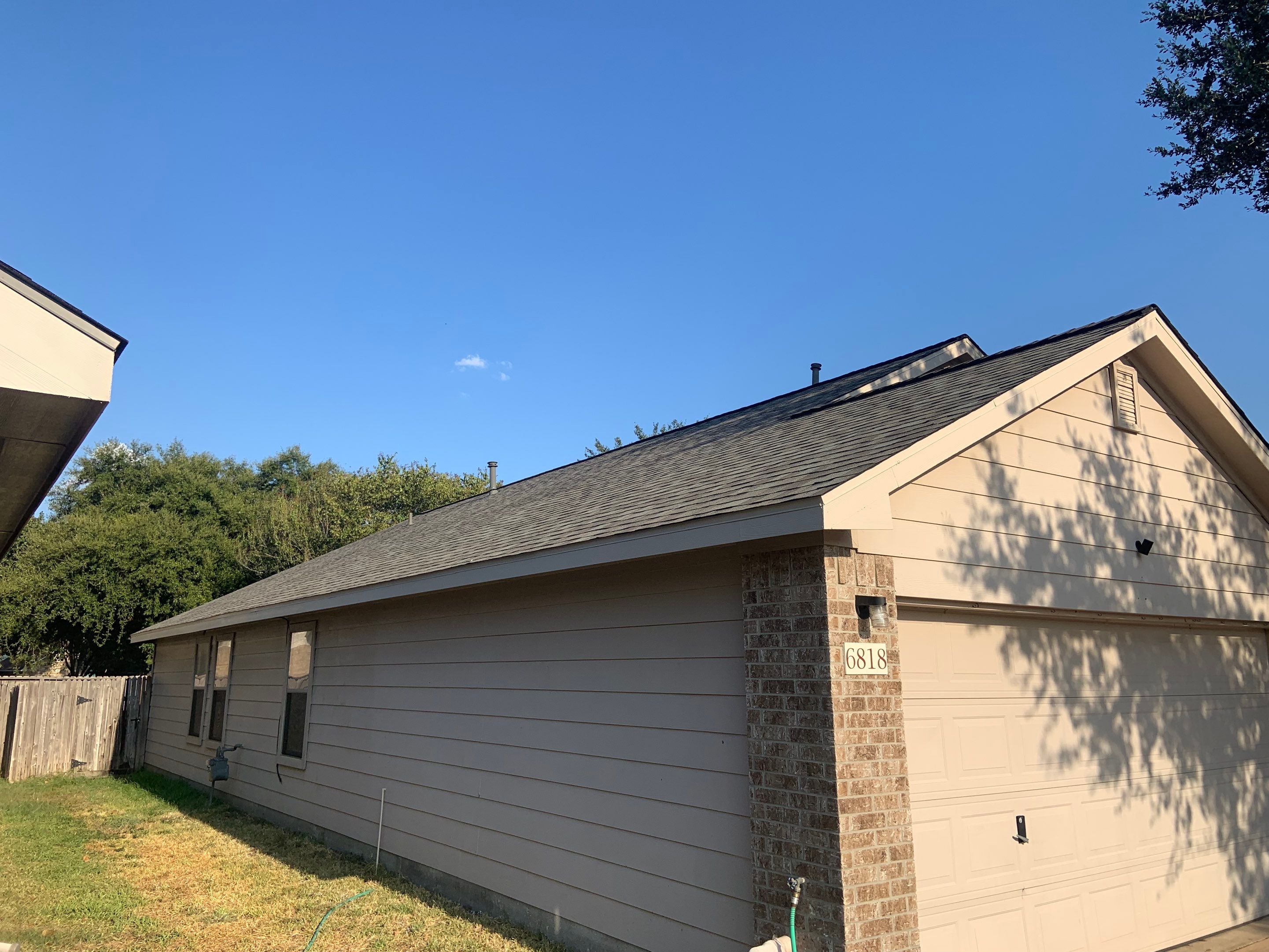 AMIG approved this roof for wind damage, fascia painting, and window work. by Roof Repair Company