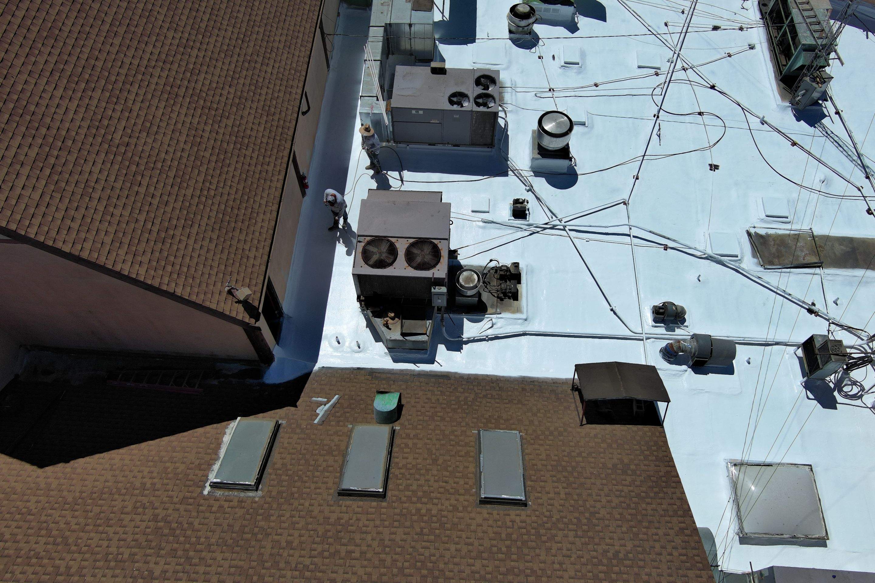 Spray foam and coatings using General Coatings acrylic coatings and spray foam by Straight Edge Roofing Inc