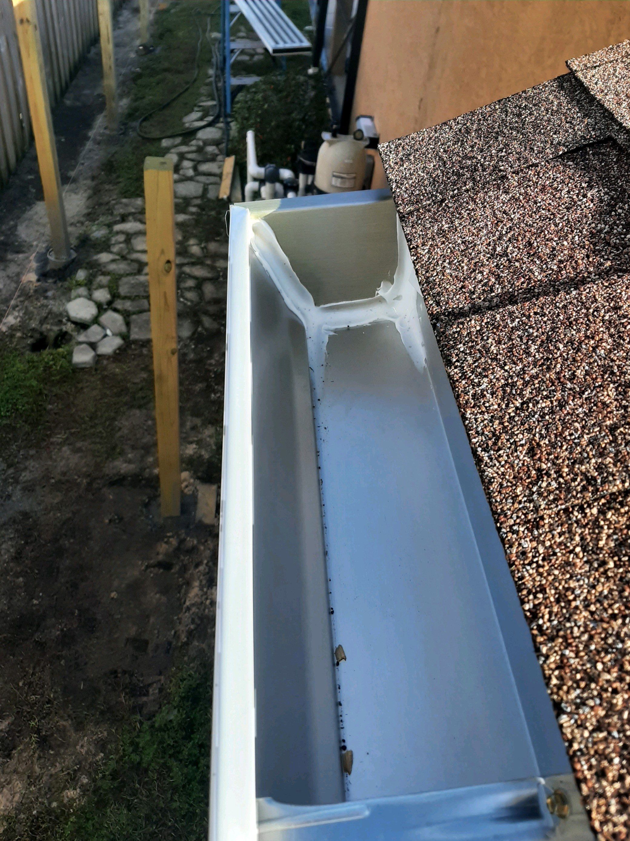 Seamless Gutter Installation using White K-Style Gutters by Gutter Professors