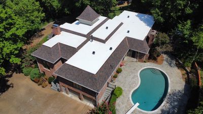 Residential Roofing Installation using Certainteed Belmont Shingles and TPO