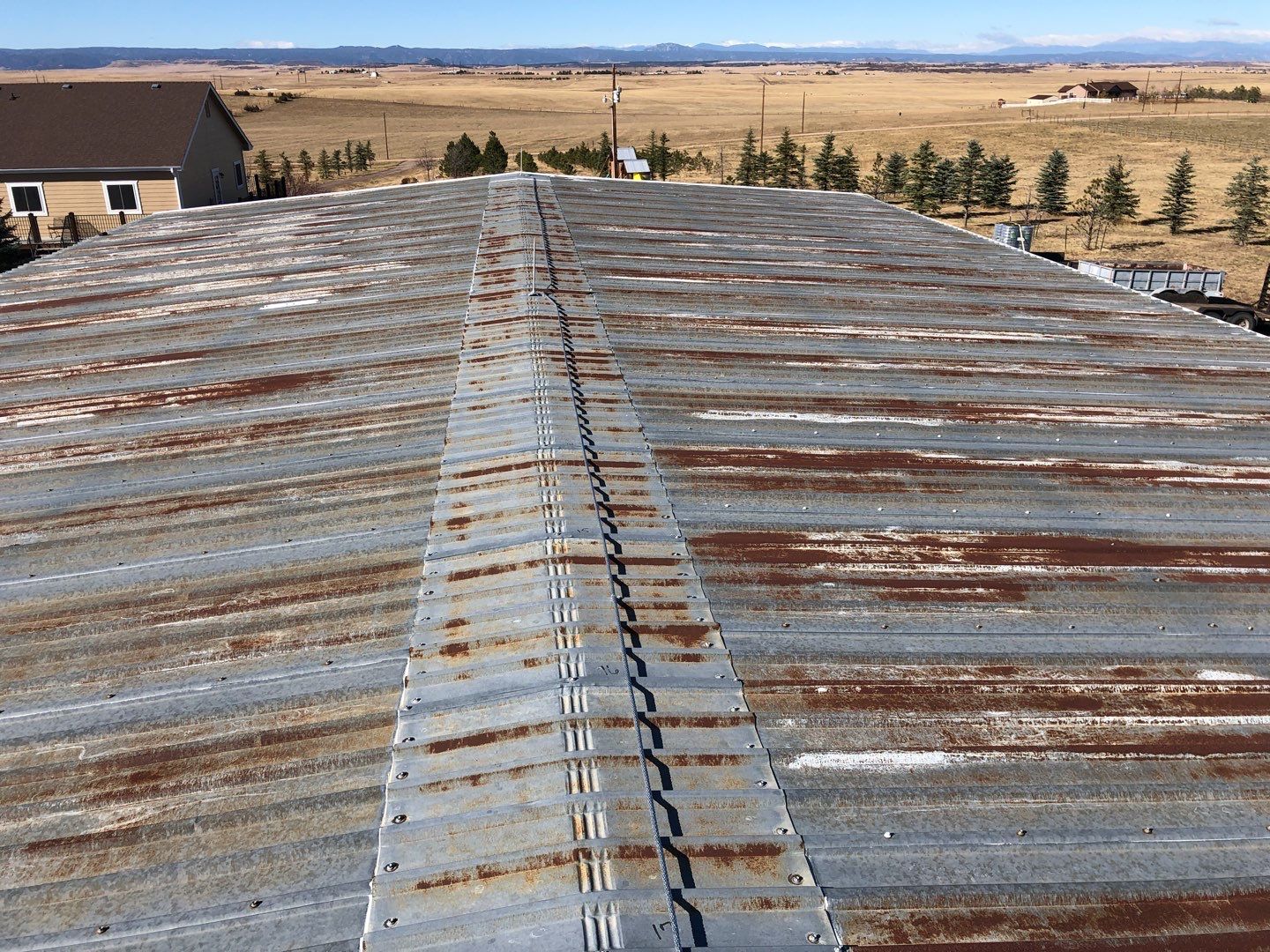 Residential Roofing Installation using Metal roofing by American Roofing & Construction LLC