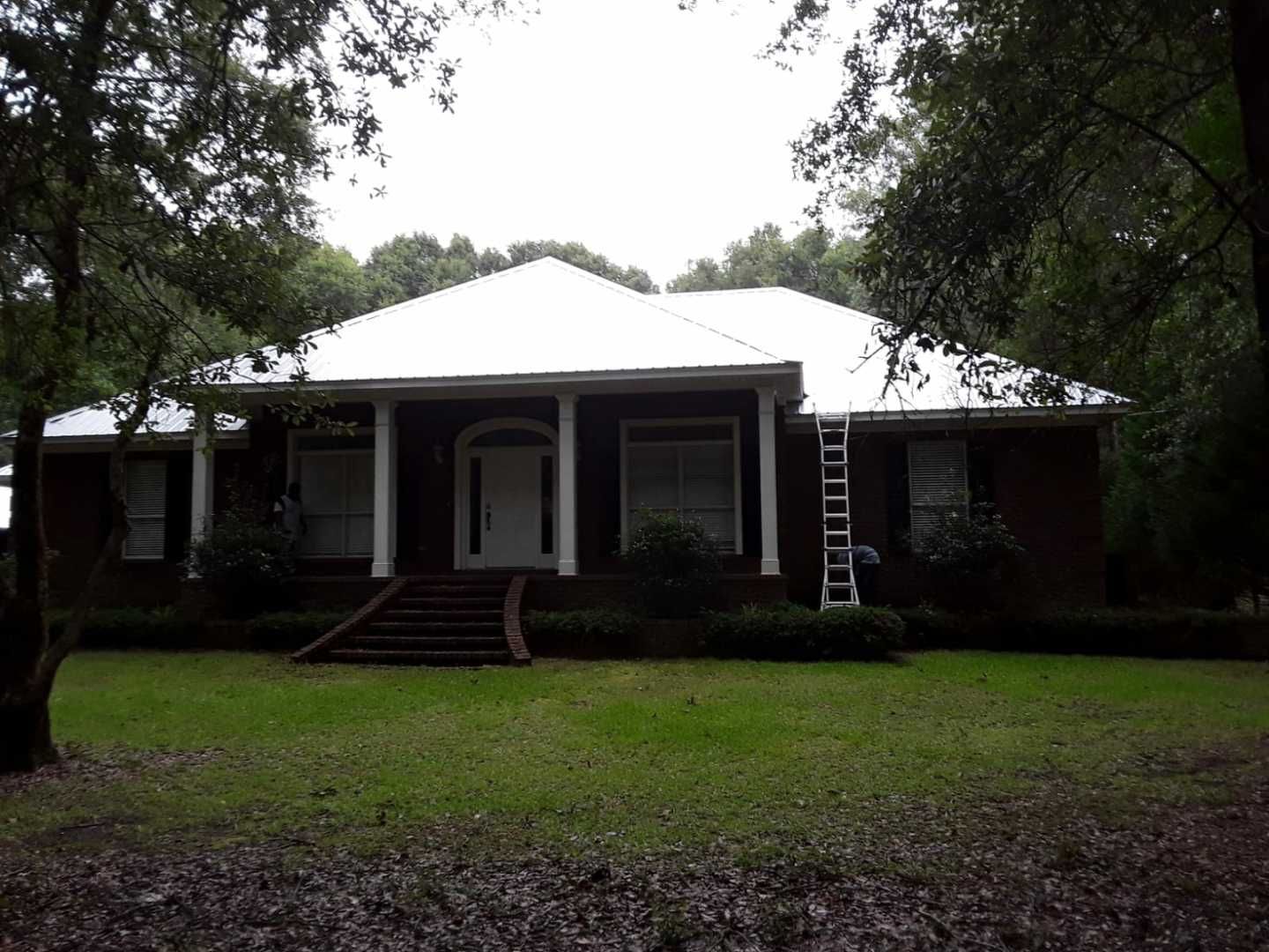 Residential Roofing Installation using Metal roofing by American Roofing & Construction LLC