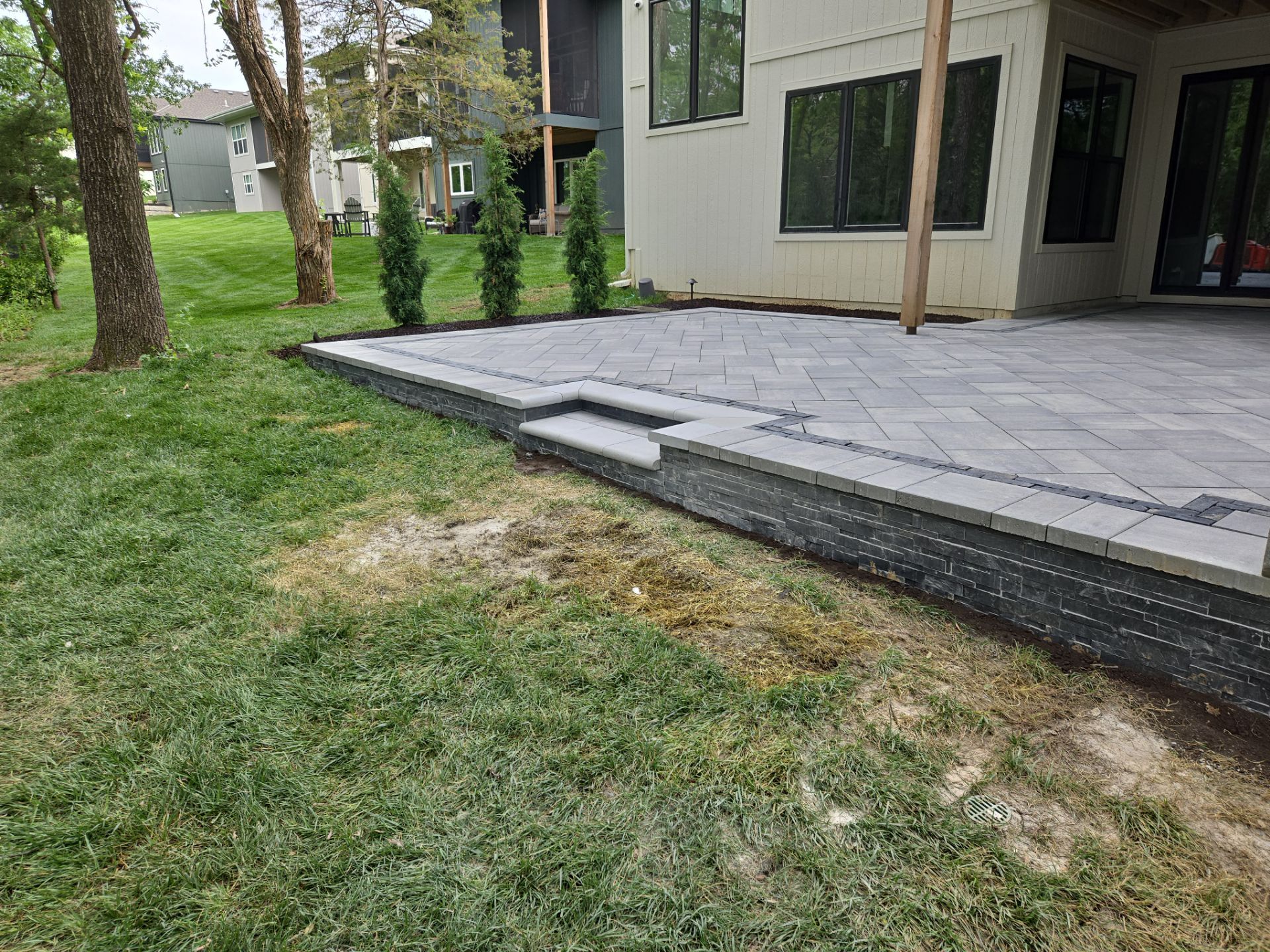 Beacon Hill Paver Patio by LAND ESCAPES LLC