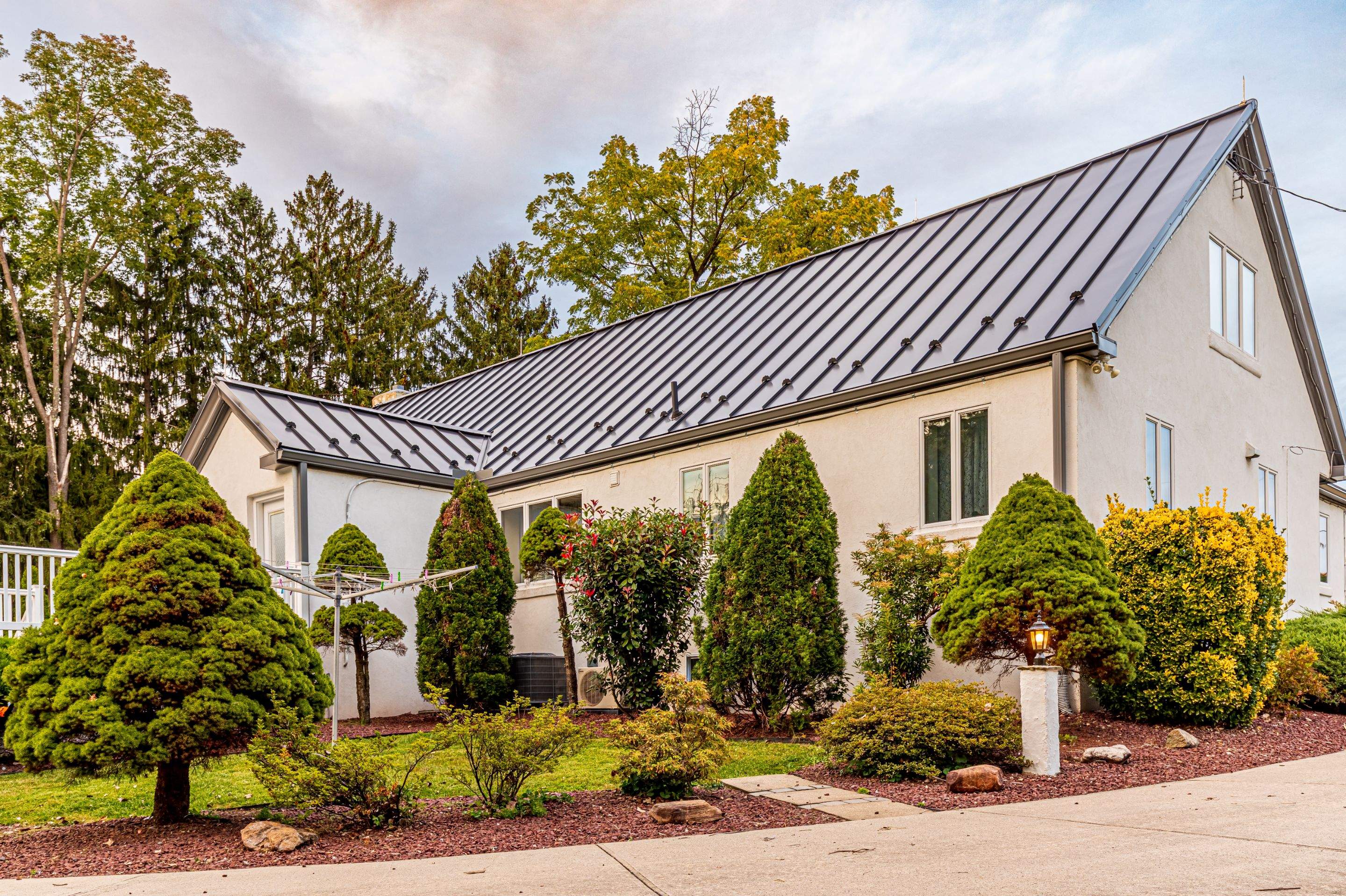 Standing Seam Metal roof-black by Esh Builders