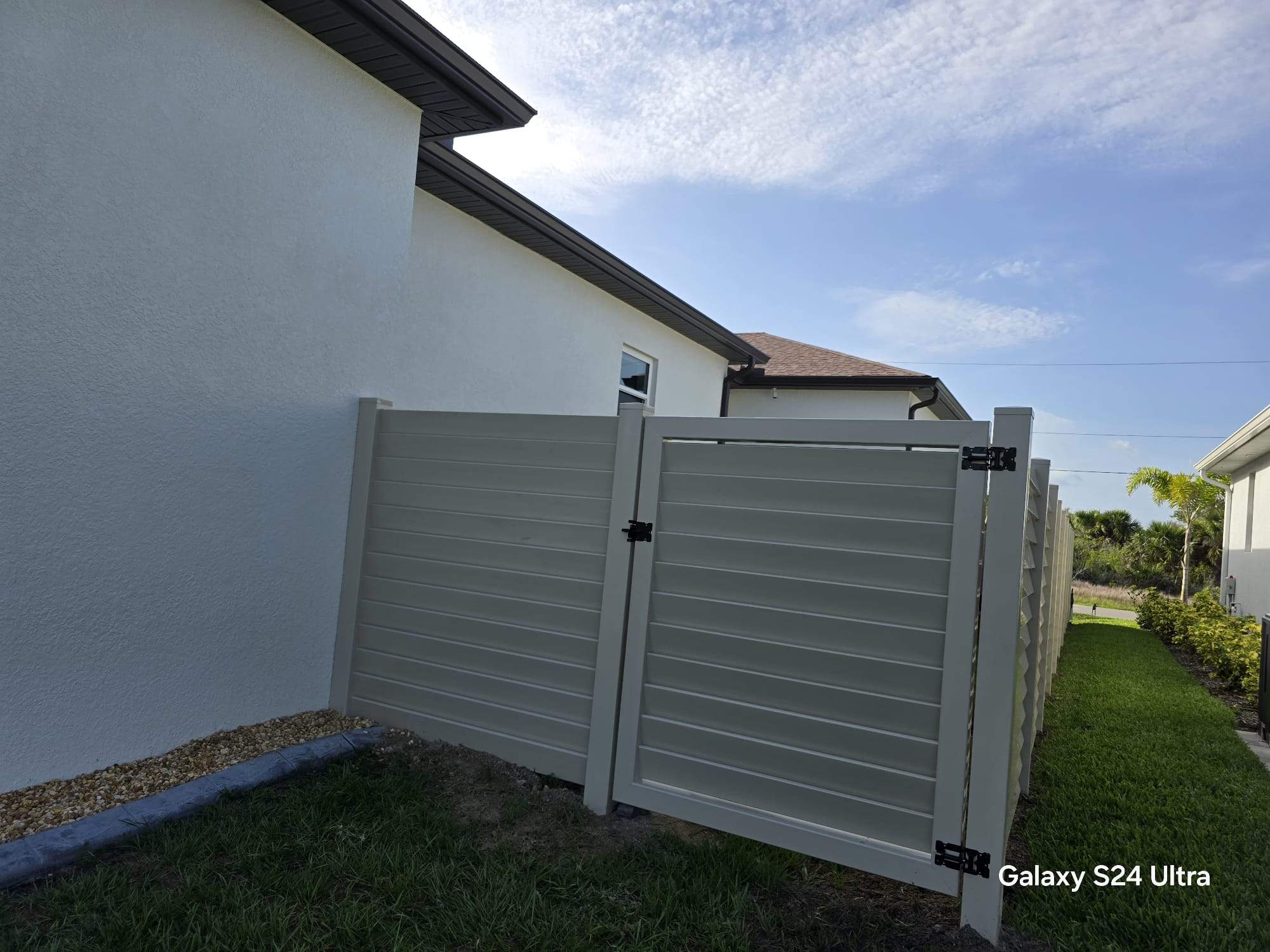 Tan Louvered Vinyl in Port Charlotte by True Fence LLC