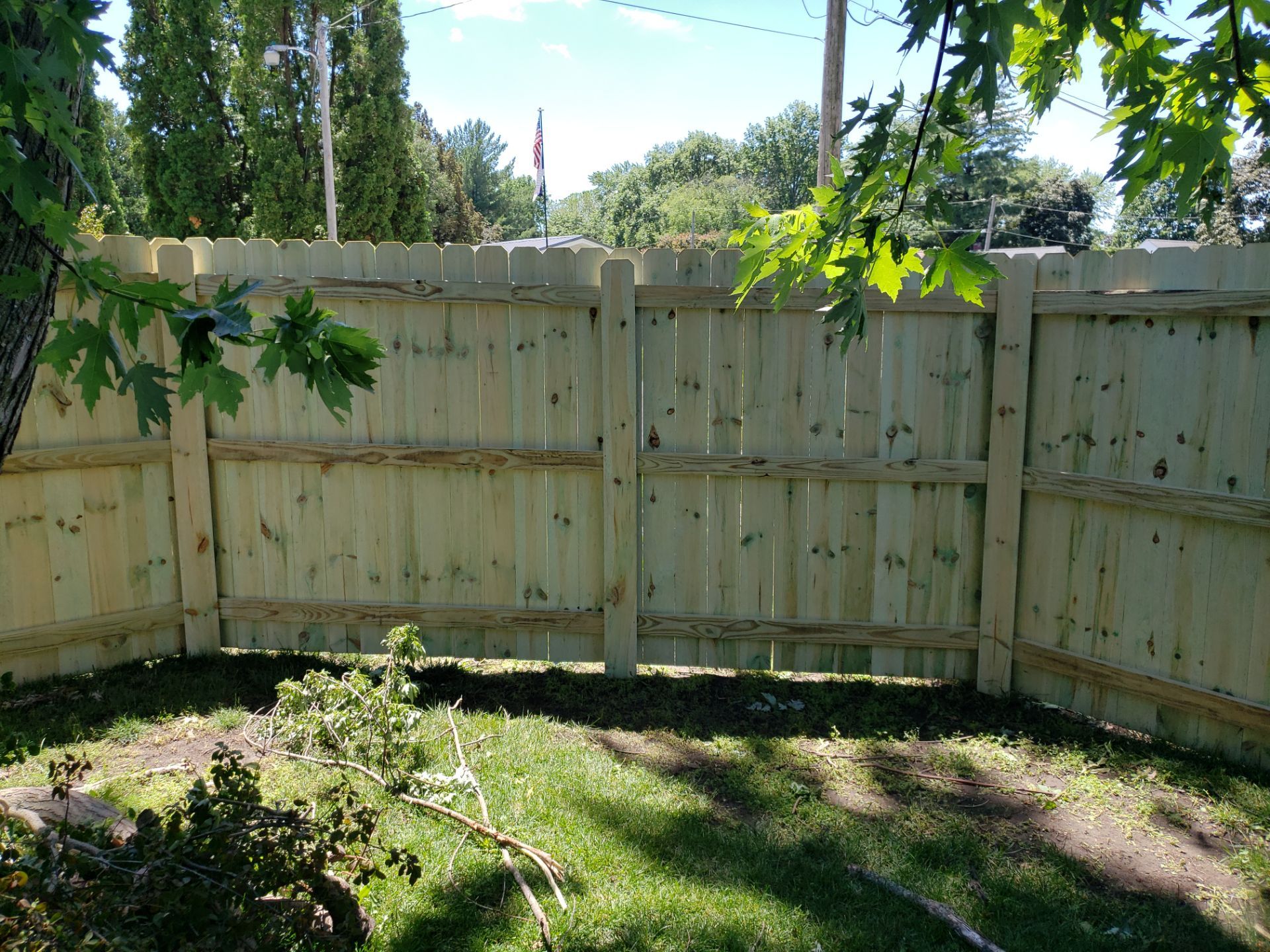 Pressure-Treated Pine Privacy Fence Replacement in Waterloo, Iowa by Perfect Picket Fence and Stain