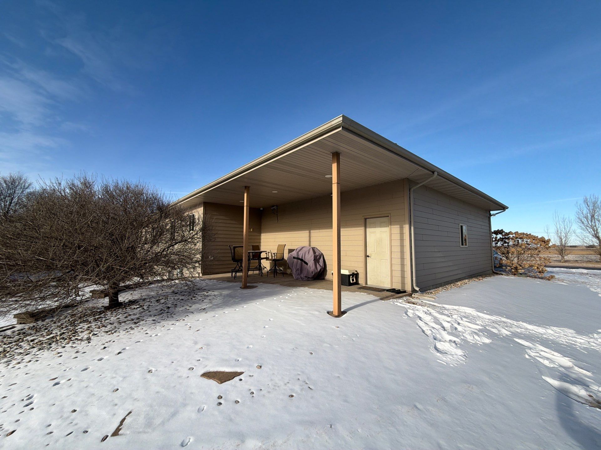 Full Exterior Siding Transformation and Trim Update in Garretson by Select Painting, Coatings & Garage Cabinets
