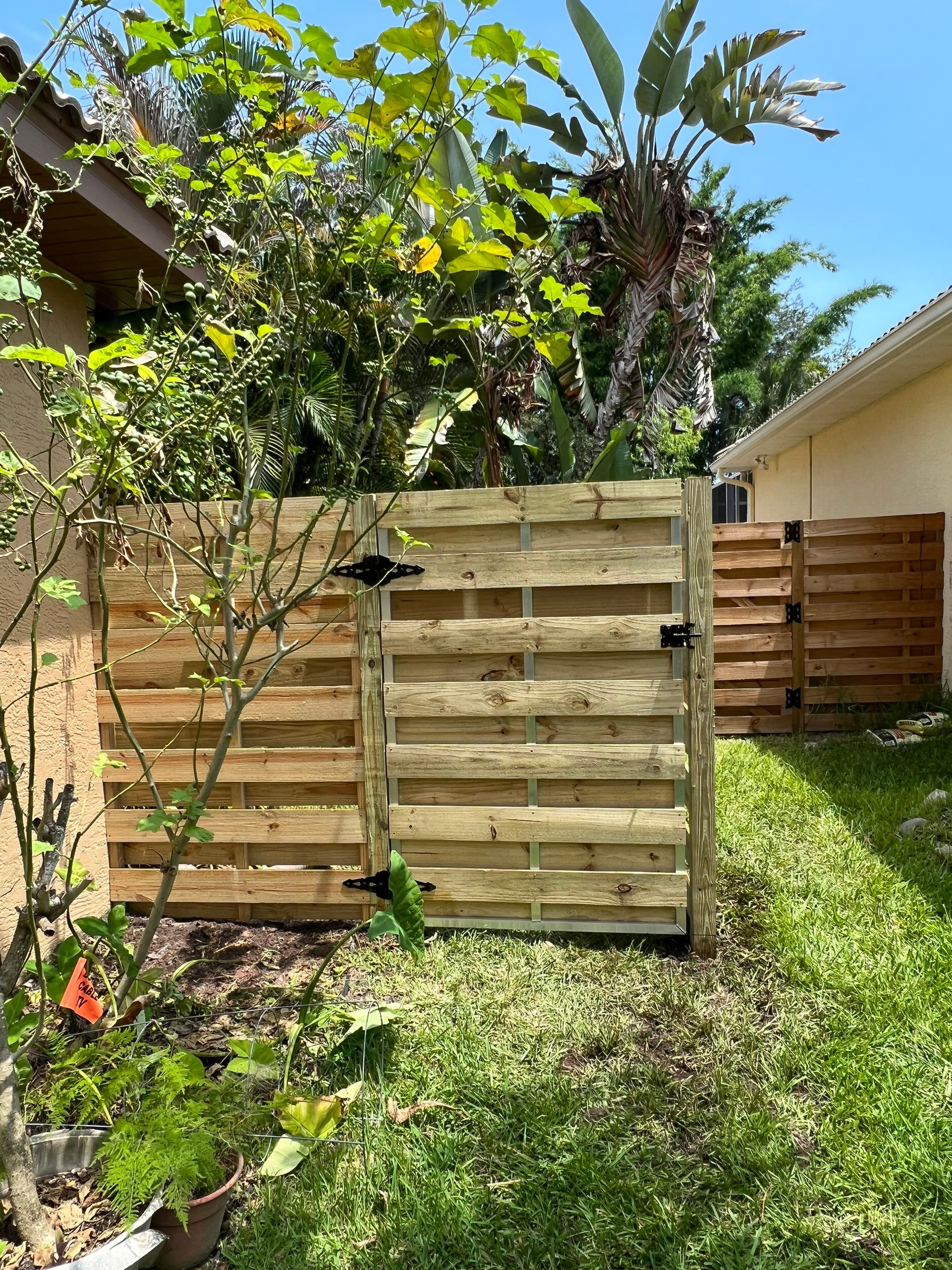 Osprey, FL 6ft. Tall Treated Horizontal Shadowbox Wood Fence by Asap fence and gates, LLC