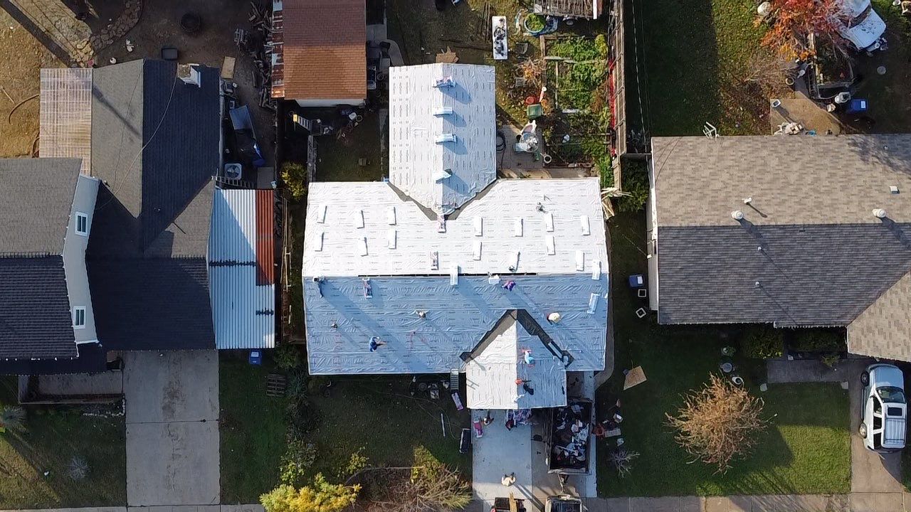 Complete Exterior Renovation: Roof, Custom Porches & Concrete Patio in Garland, TX by road roofing llc