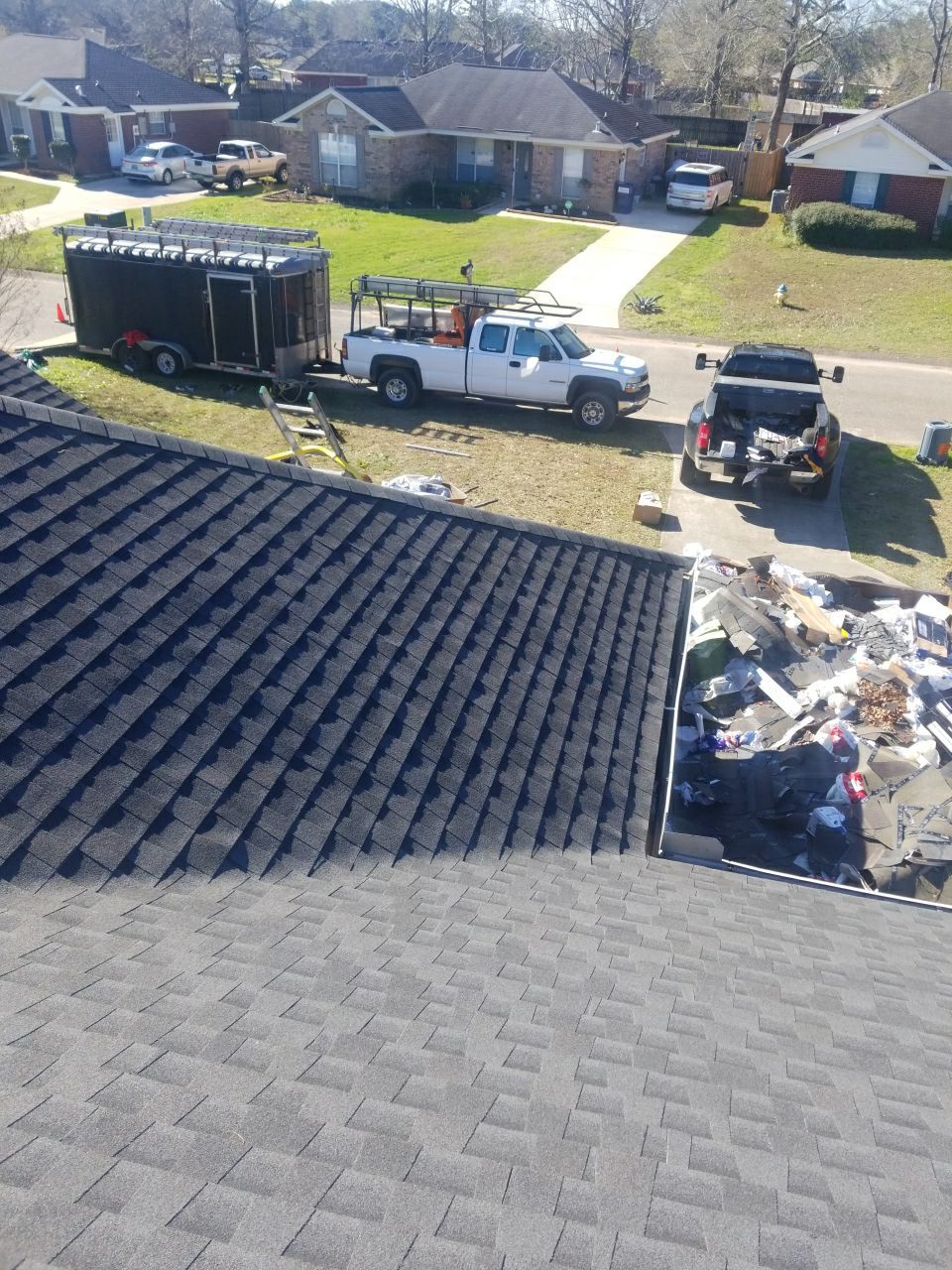Residential Roofing Installation using Roof Replacement by American Roofing & Construction LLC