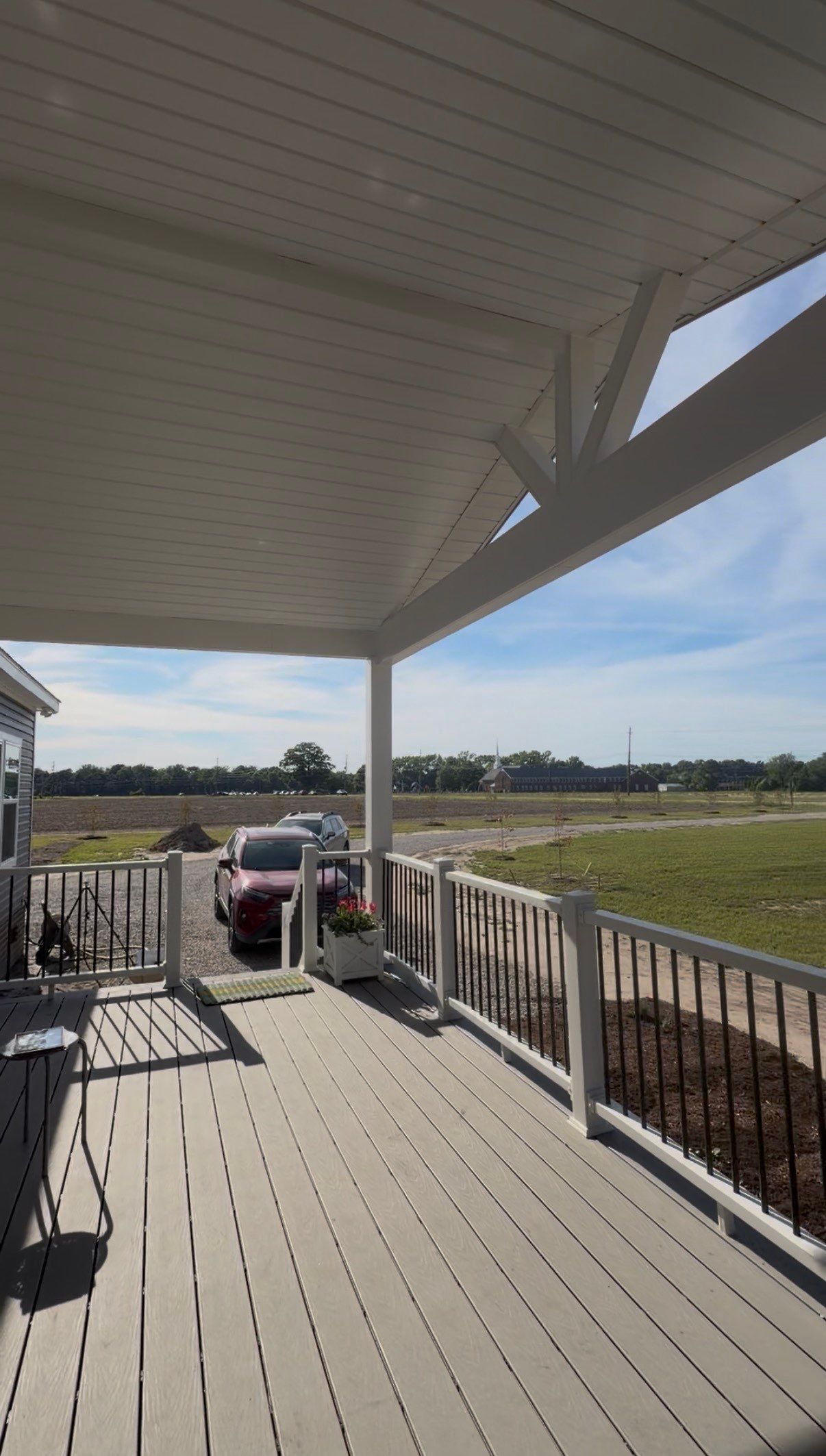 Custom Trex Covered Deck and Gabled Roof in Winterville by The Remodeling Company