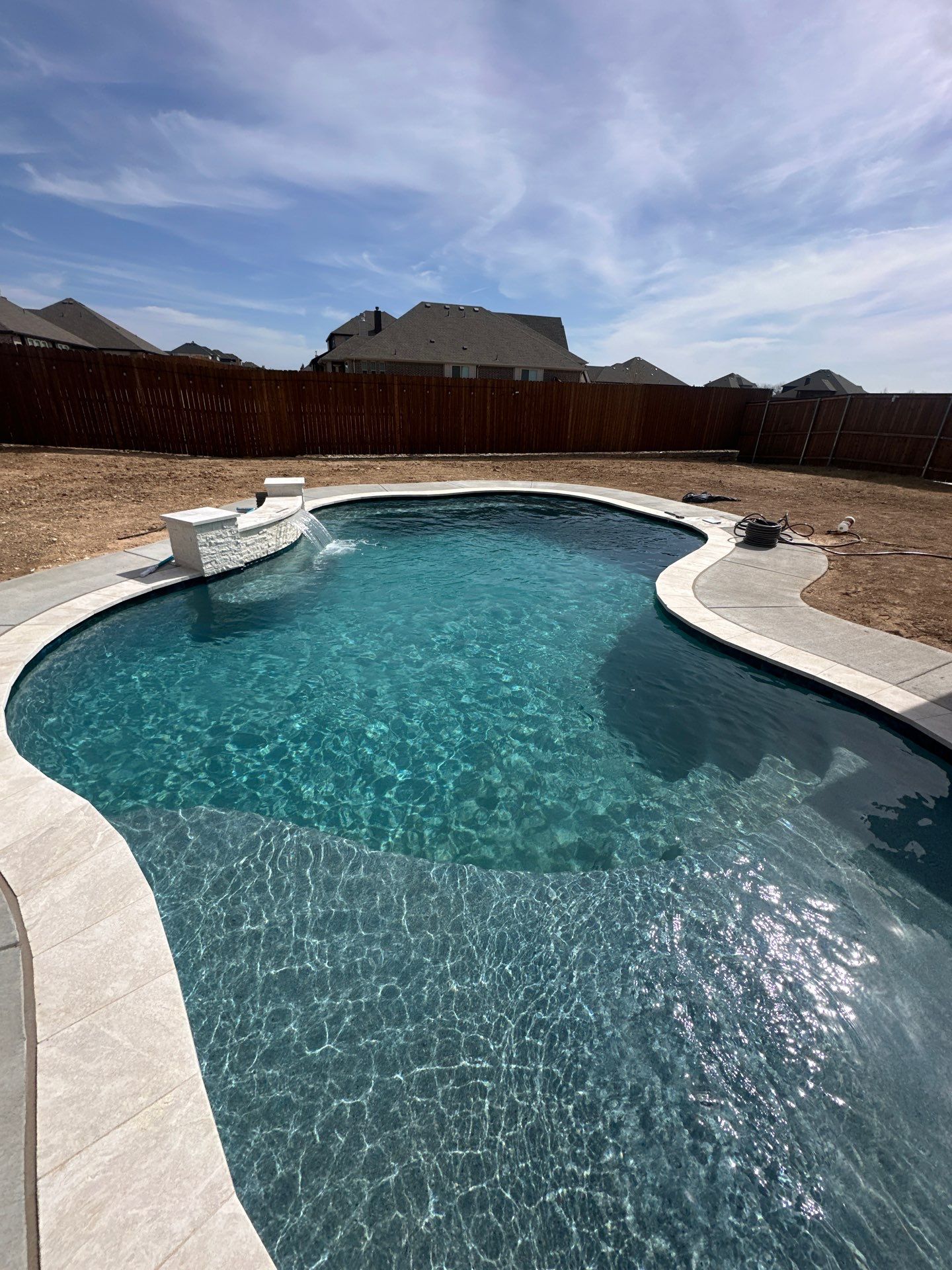 Large Freeform Pool with Tanning Ledge by Pinnacle Pools and Spas - DFW
