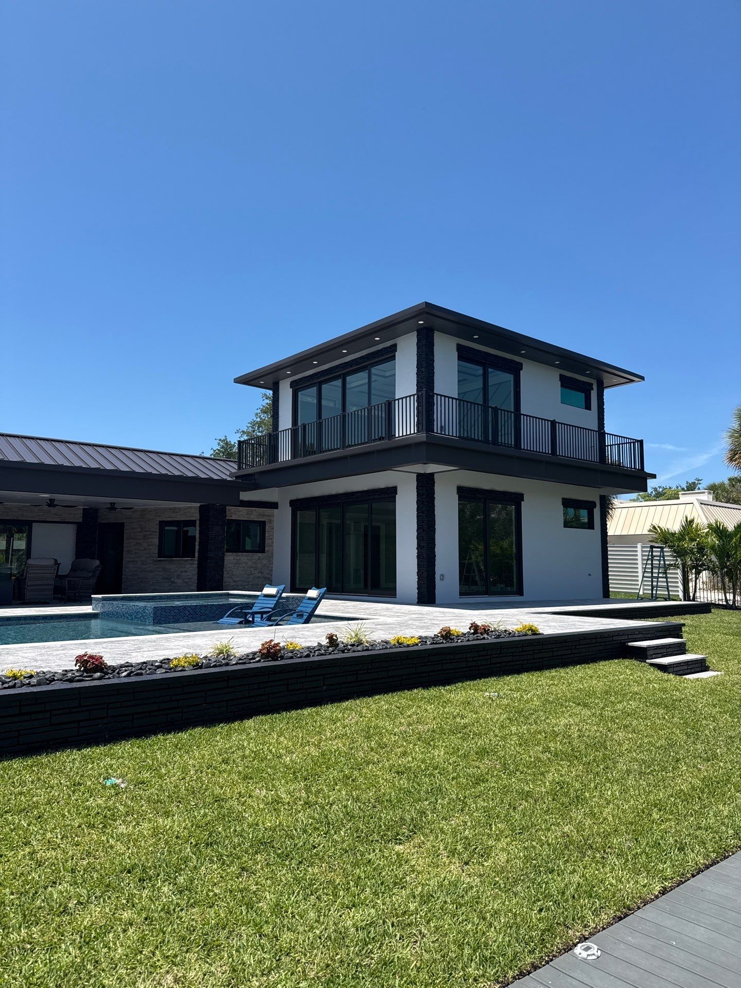 7-Inch Smooth Box Seamless Gutters using black seamless gutters in Siesta Key Fl by Gutter Professors