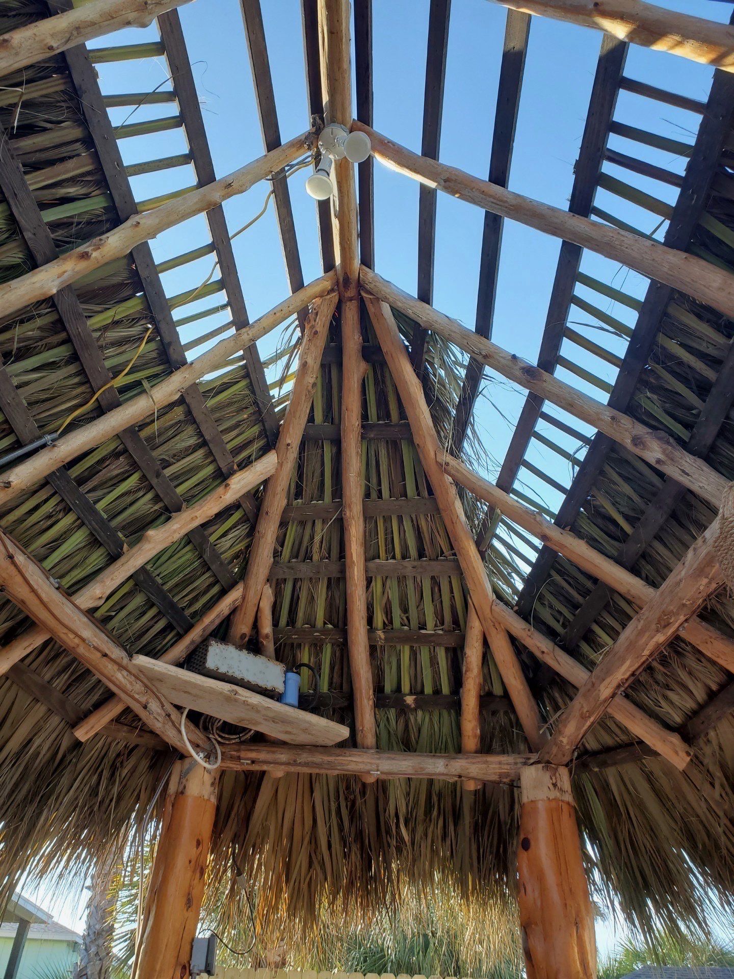 Poolside paradise by Bayfront Roofing and Construction
