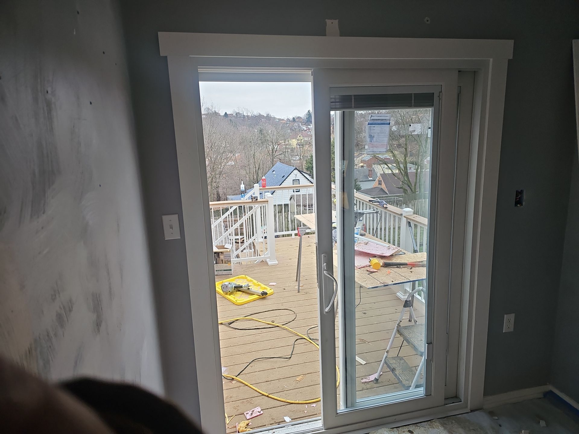 Deck and door by Cousins Roofing Siding & Decks