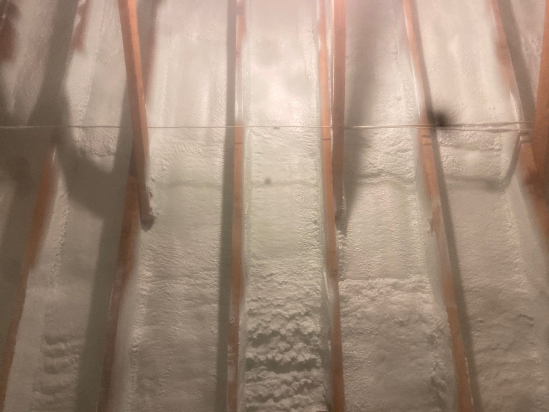 Attic Retrofit using open cell spray foam by NYS Foam & Energy
