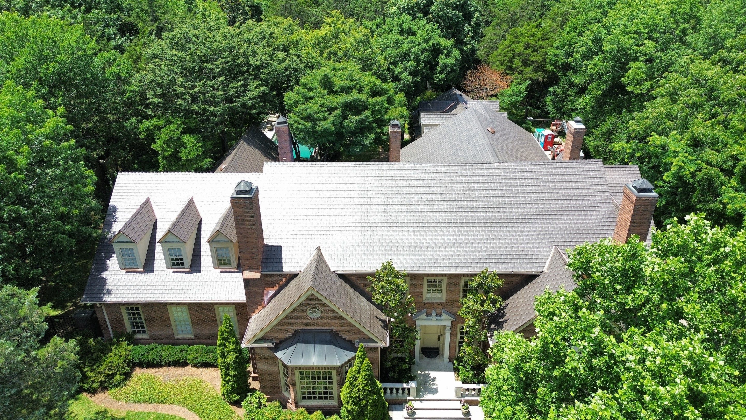 Residential Roofing Installation Using Enviroshake Synthetic Slate by Undersun Roofing 