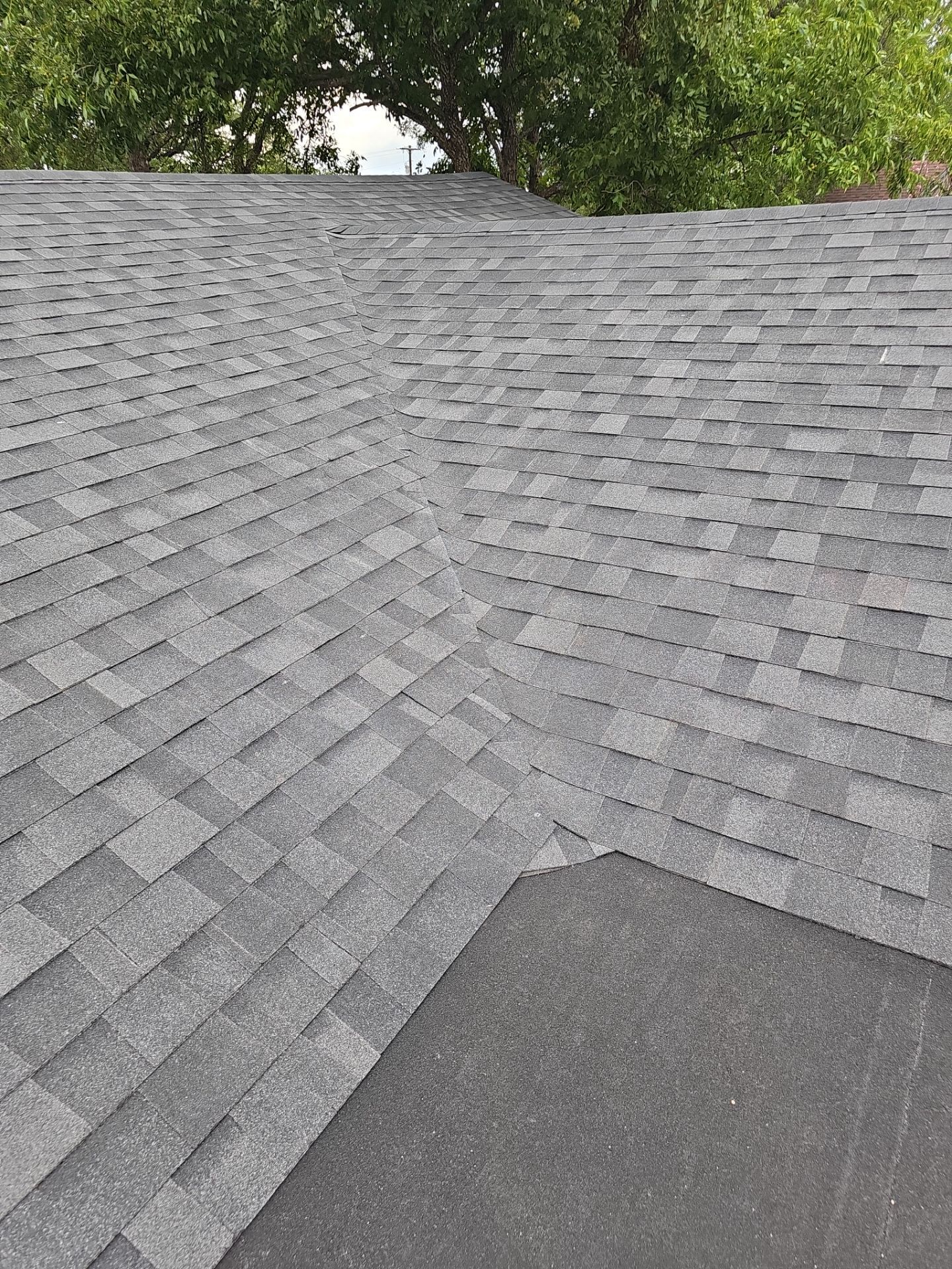 Residential Roofing Installation using Owens Corning Oakridge Onyx Black by DeZign Roofing & Exteriors