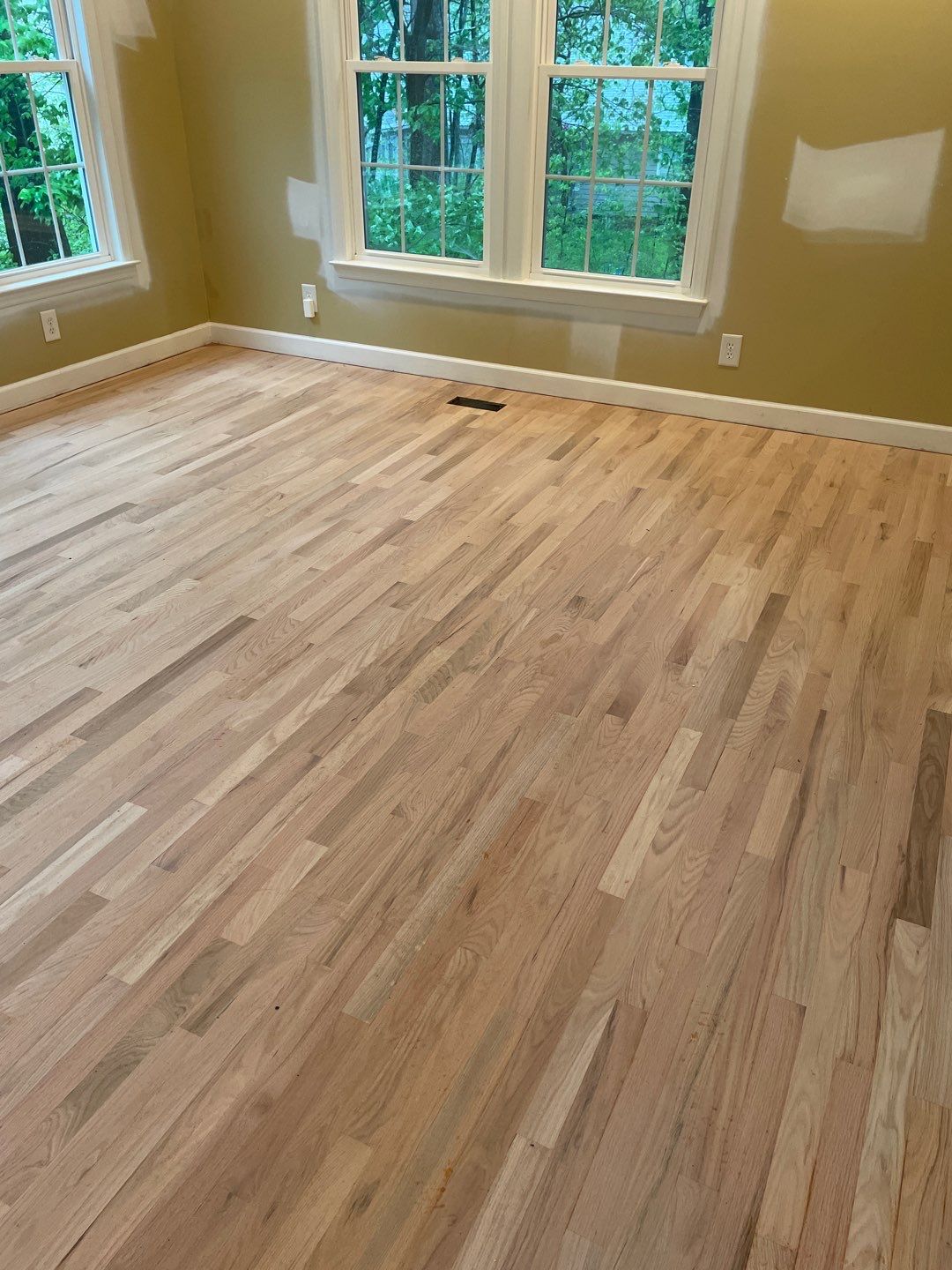 Red oak floor refinishing by Accent Custom Floors