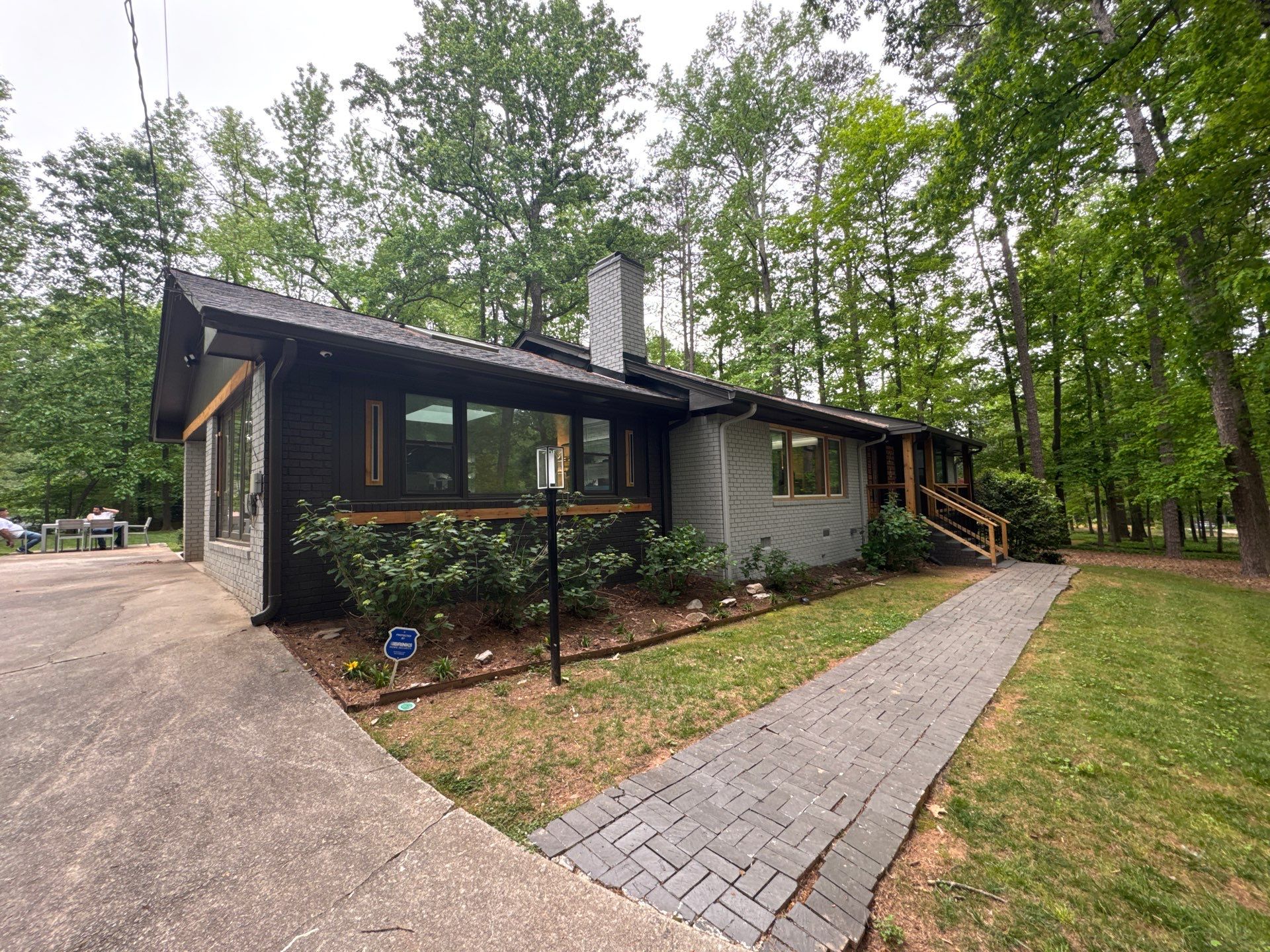 Modern Exterior Transformation and Multi-Tiered Deck Installation in Decatur by Swift Home Renovations