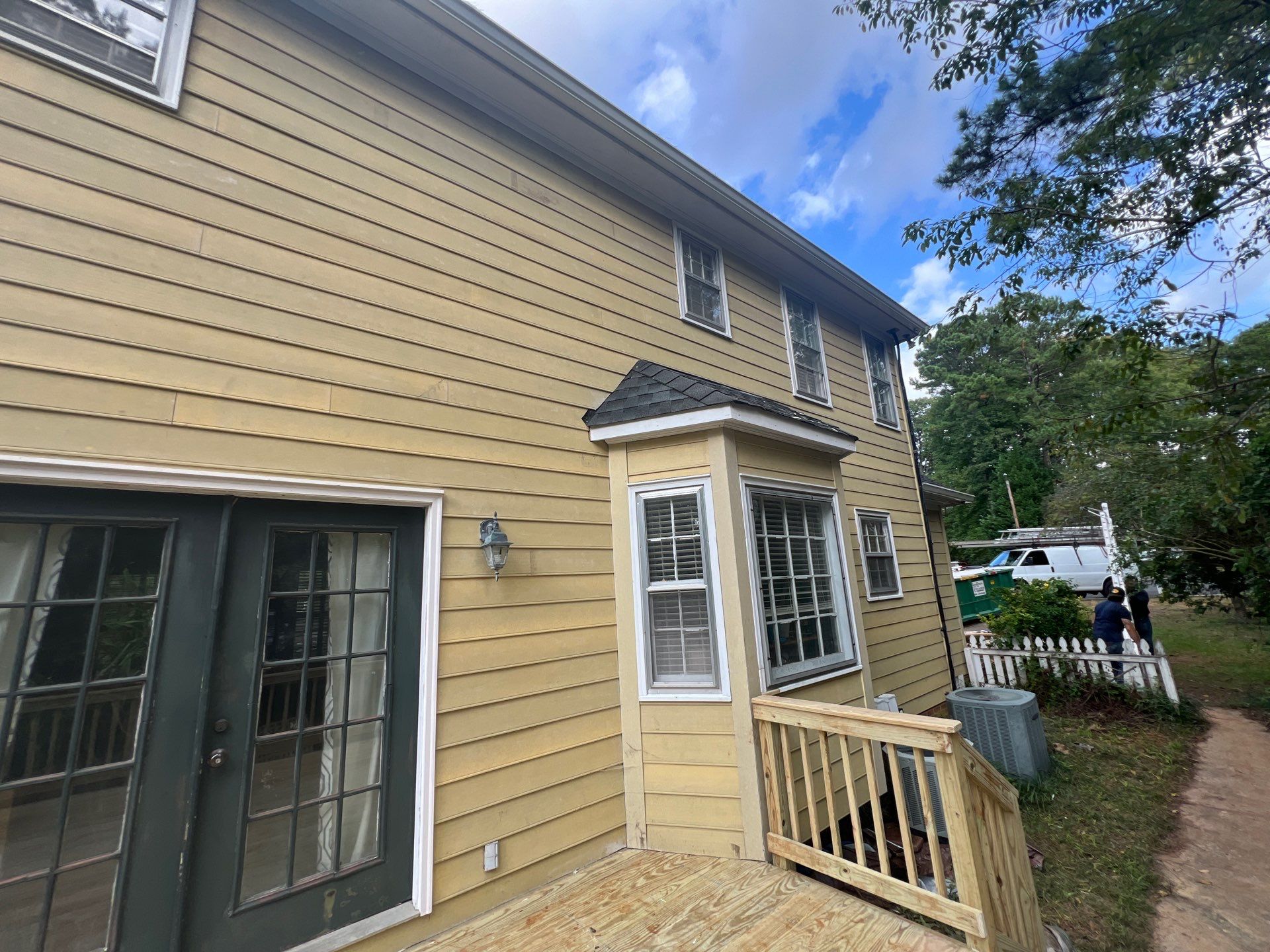 James Hardie Siding Replacement and Custom Deck Construction in Cary by The Remodeling Company