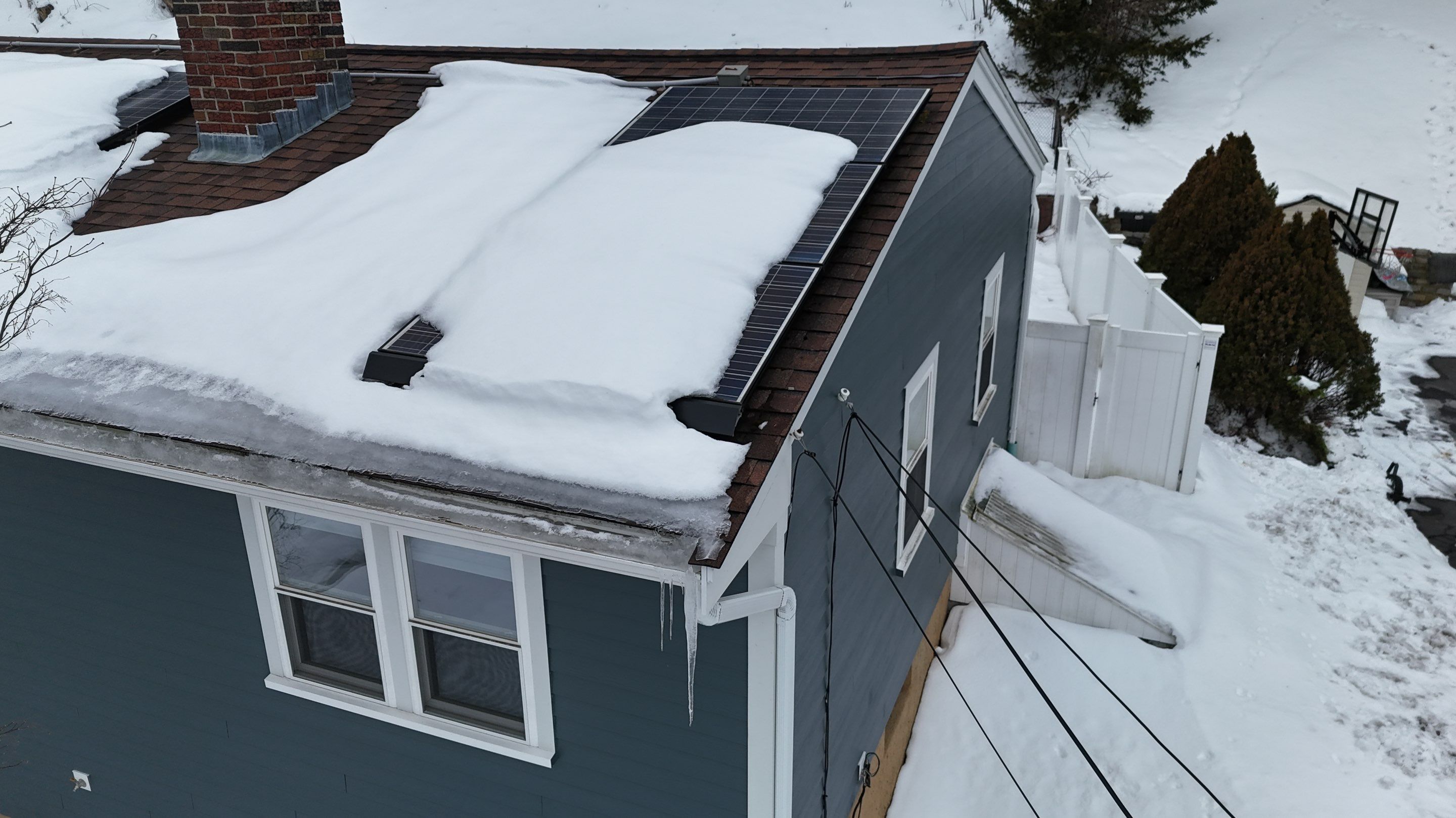 Ice Dam Removal & Snow Removal in Woburn, MA by Mighty Dog Roofing of Greater Middlesex County