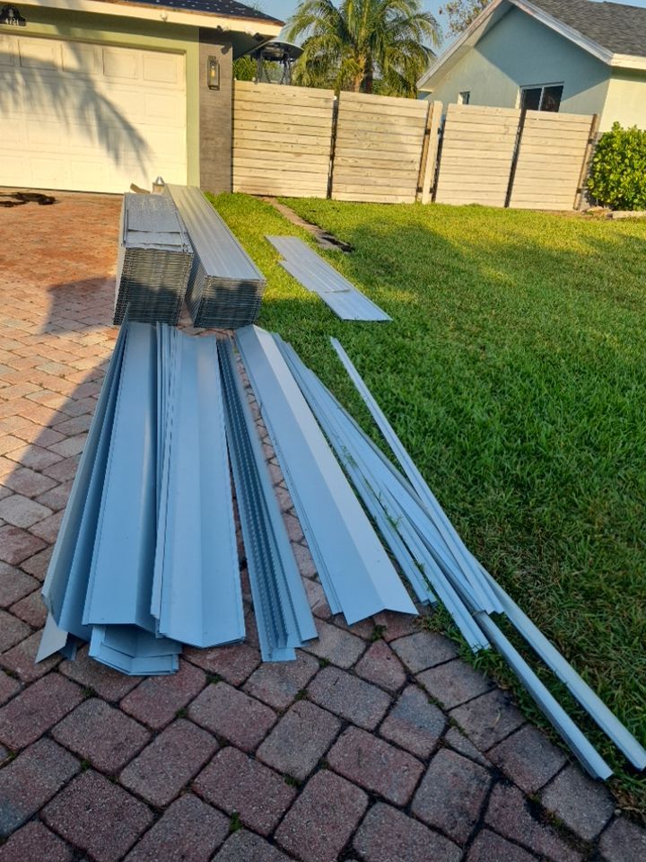Residential Roofing Installation using 1" Nail strip metal roof by BLUES BROTHERS ROOFING