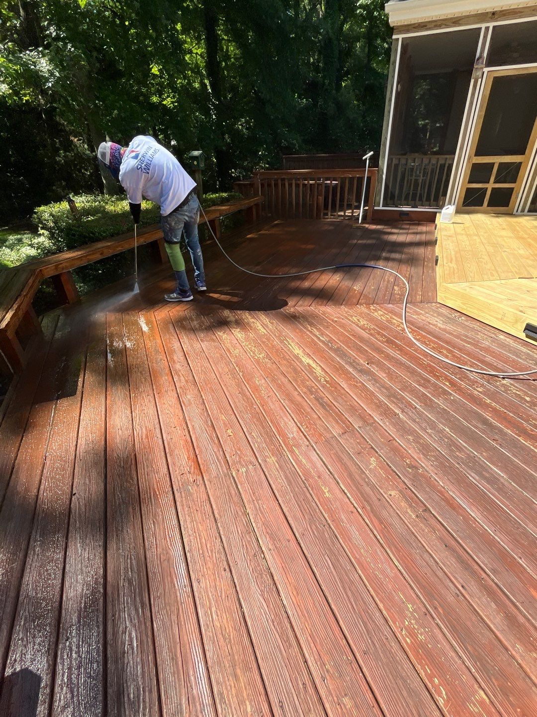 Triple deck re-staining by AKK Painting LLC