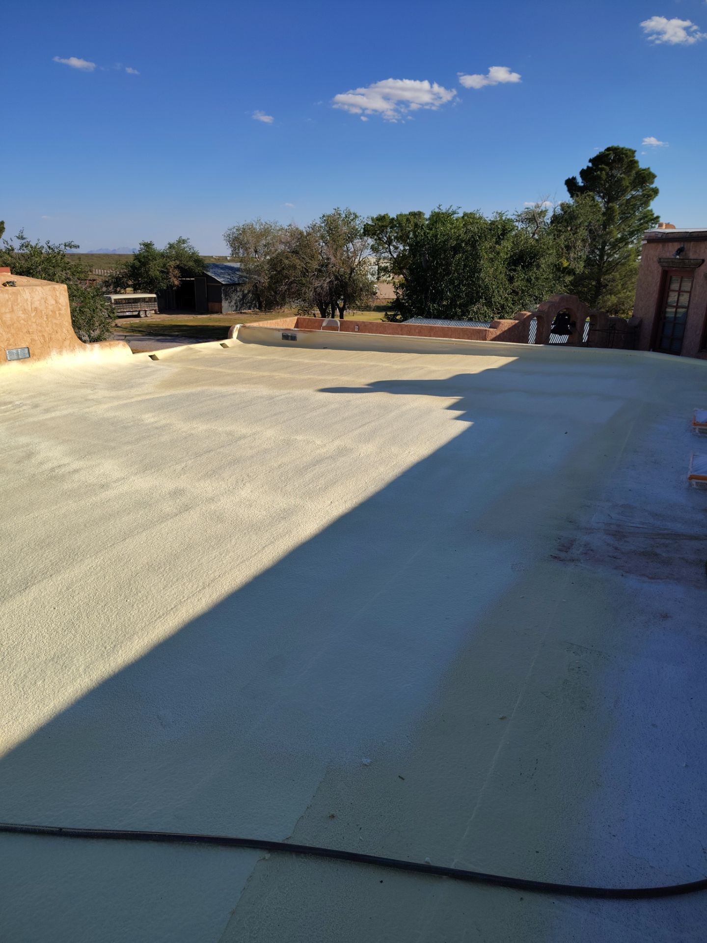 Residential roof application by SPF Services 