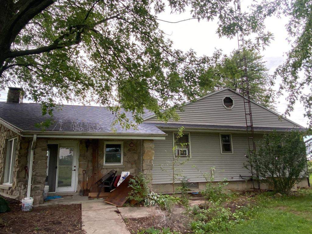Storm damage roof replacement by Nitro Roofing and Construction