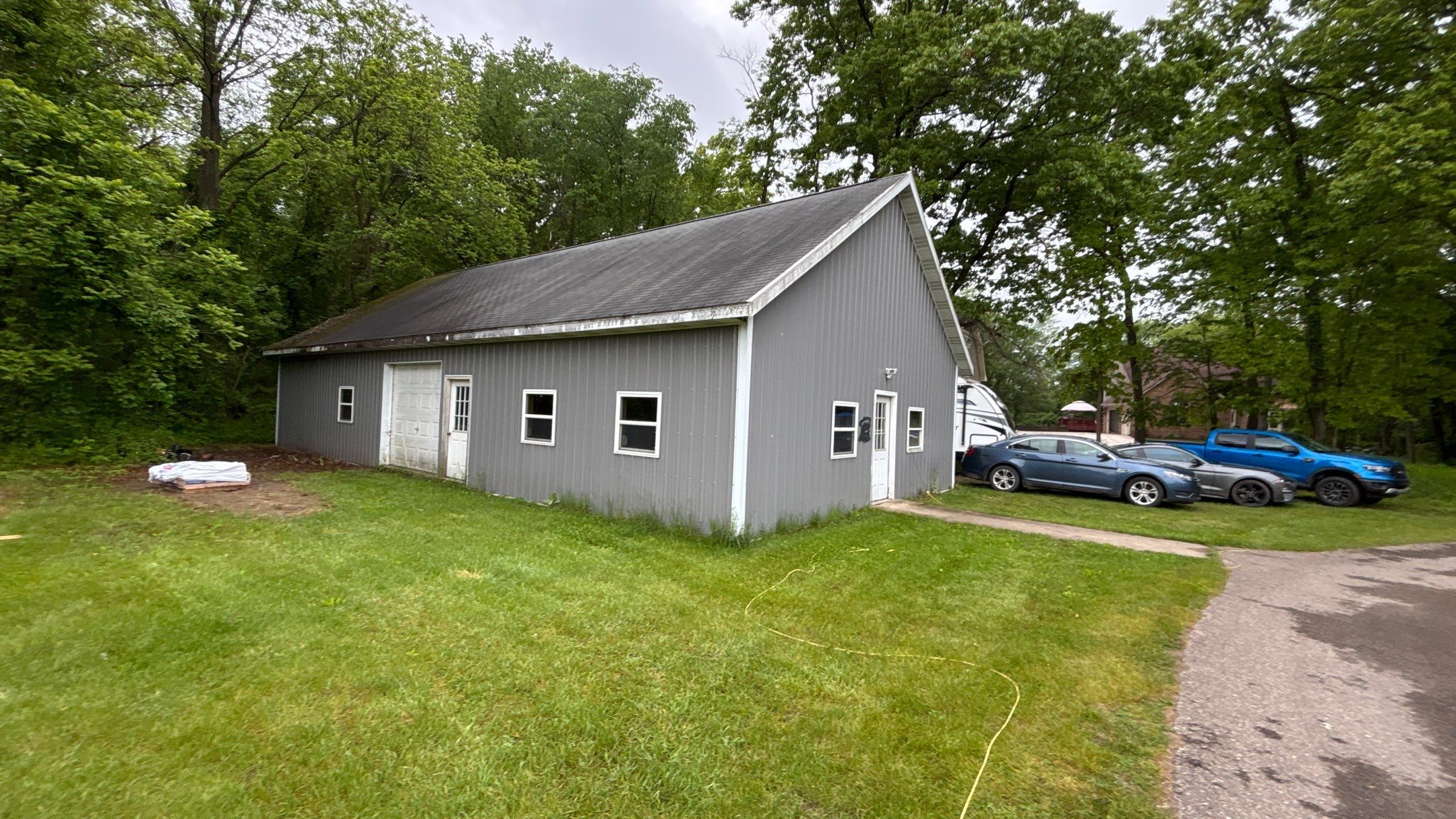 Roof Replacement using Atlas Pinnacle Pristine Pewter by 180 Contractors
