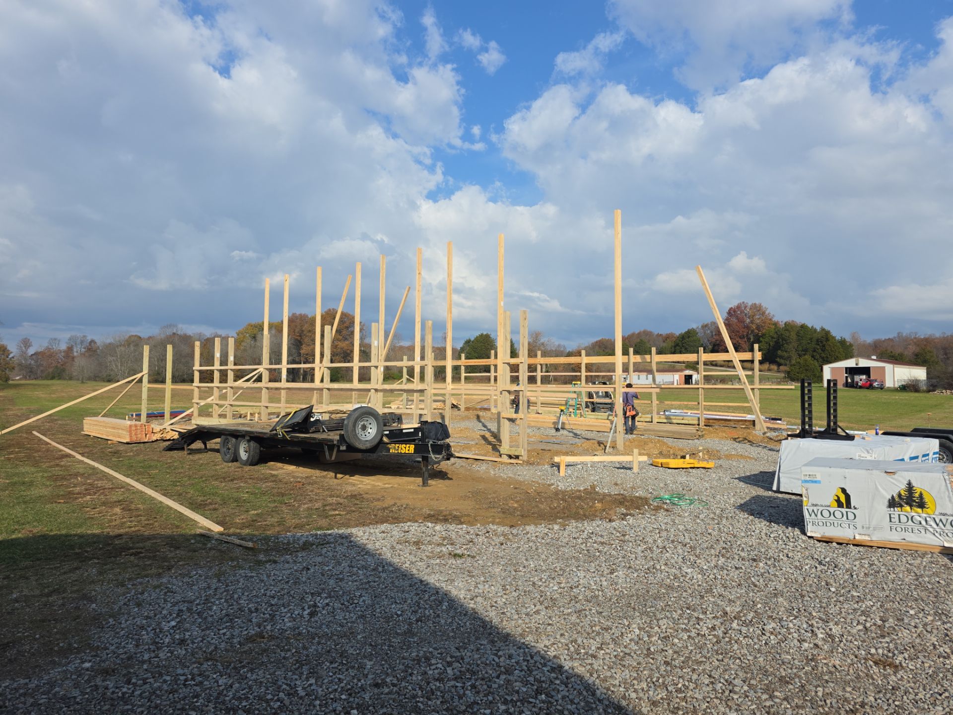 Custom Pole Barn Home with Charcoal Siding and Copper Roof by The Barn Builders