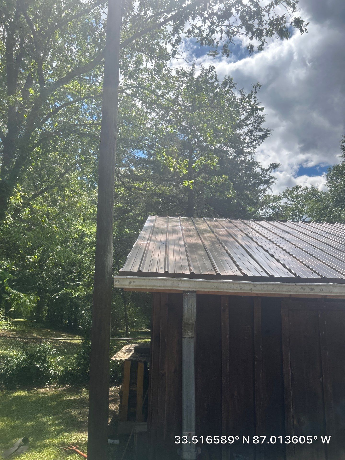 Metal Roof Replacement in Sylvan Springs (Brown) by The Roofing Dudes