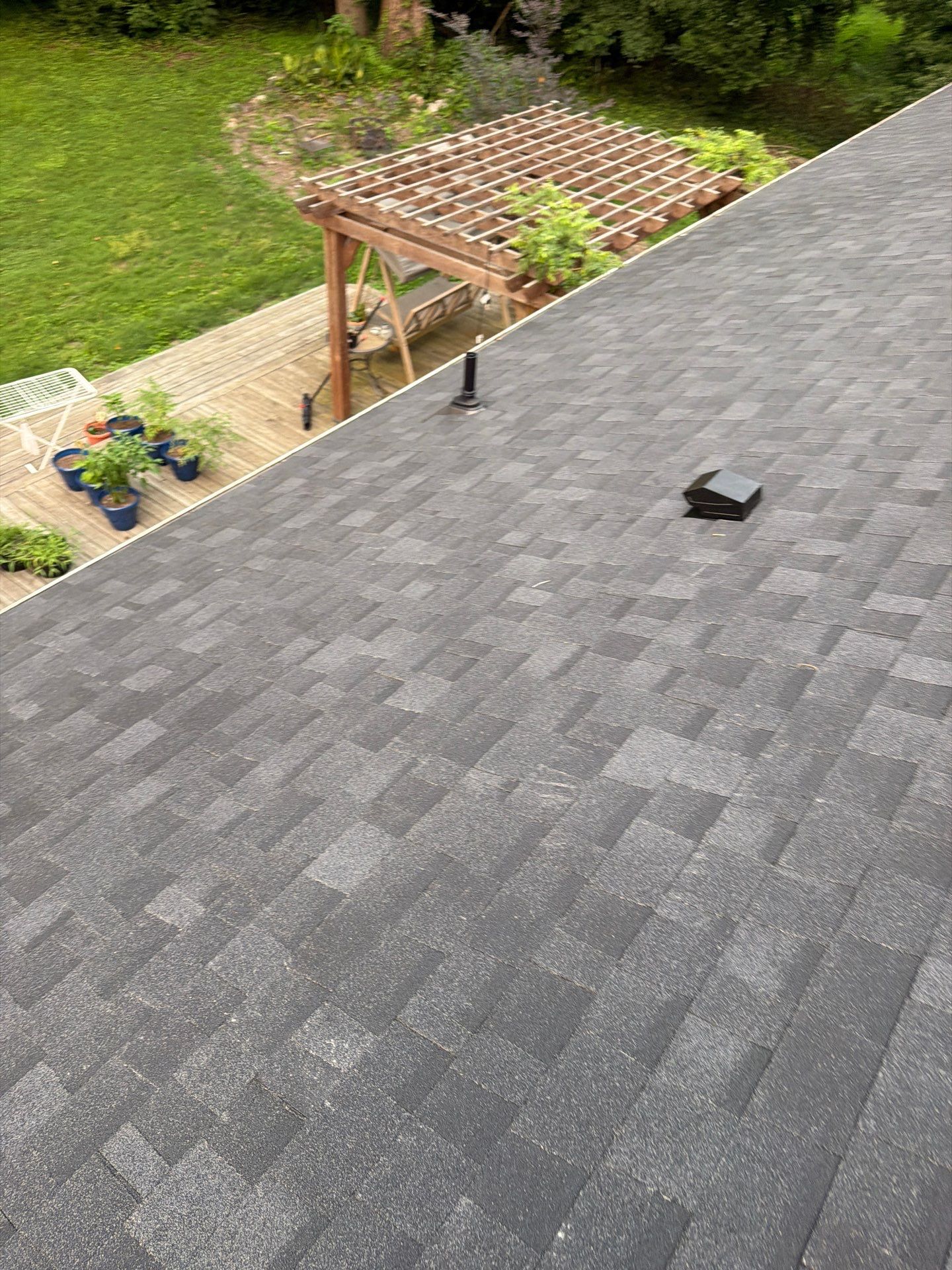 Asphalt Shingle Roof Replacement and Gutter Installation in Richmond by Cade Construction