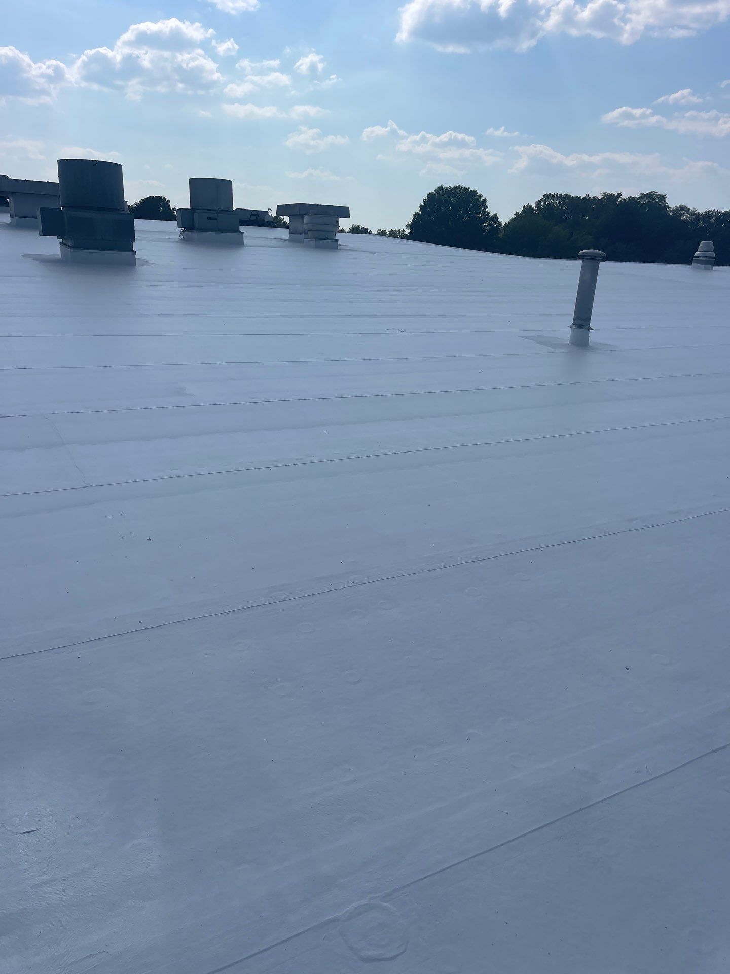 Commercial Roofing Installation using Coatings by Kentucky Commercial Roofing