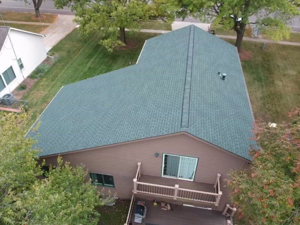 Roof & gutters by Optimal Home Improvement 
