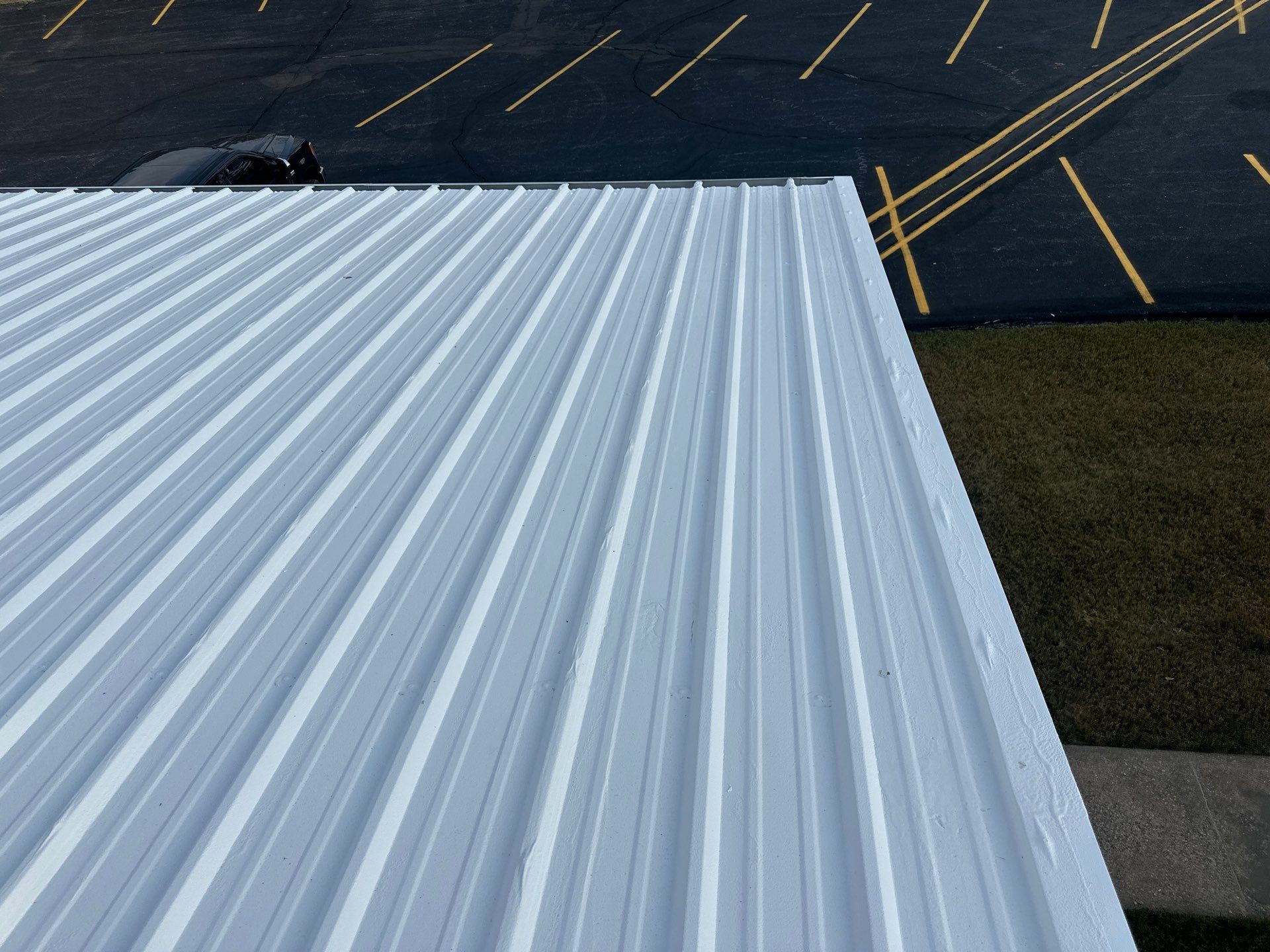 Commercial Roofing Install - Metal Coatings Restoration System  - Color White  by Titan Commercial & Residential Roofing 