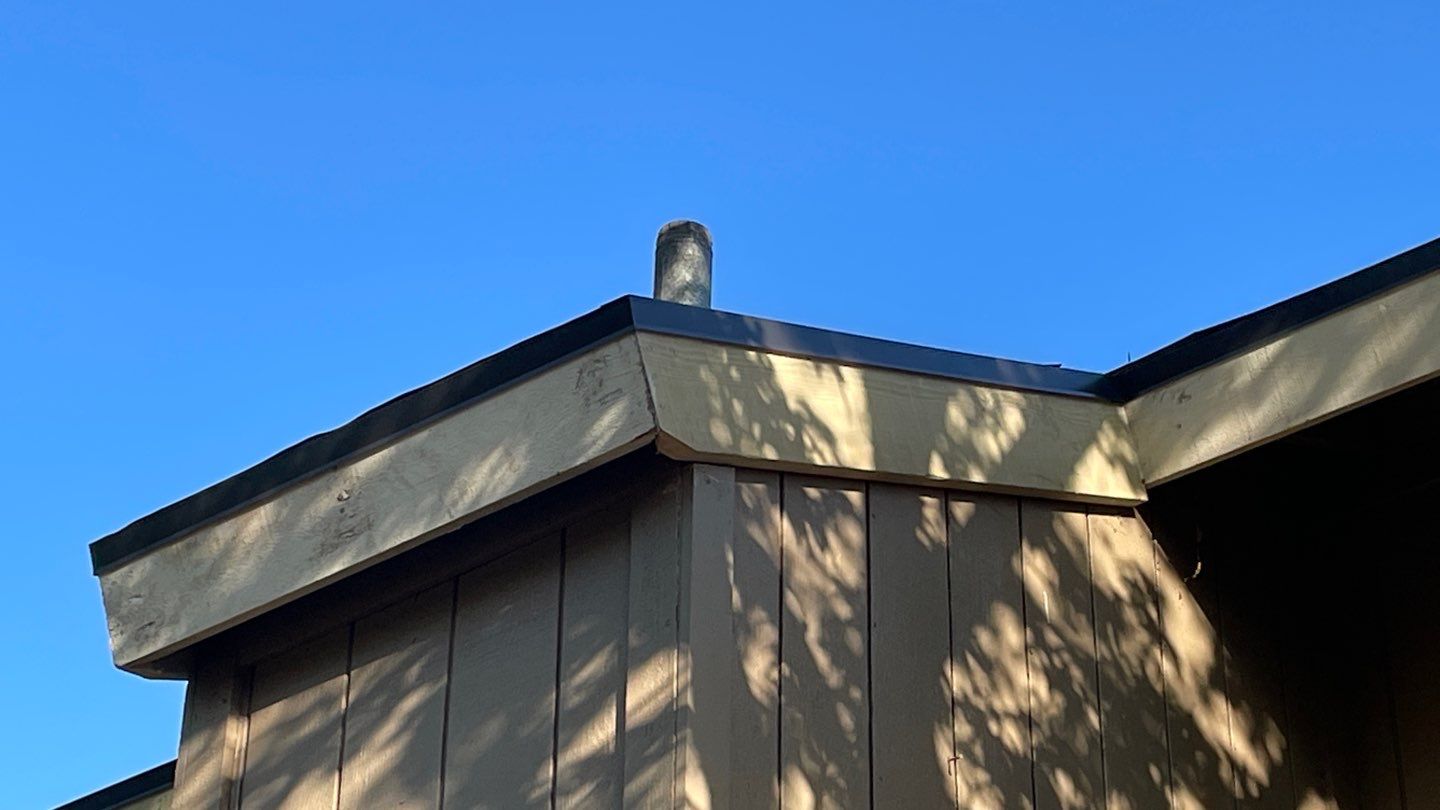 Removed tile from roof and replaced with shingles by Straight Edge Roofing Inc