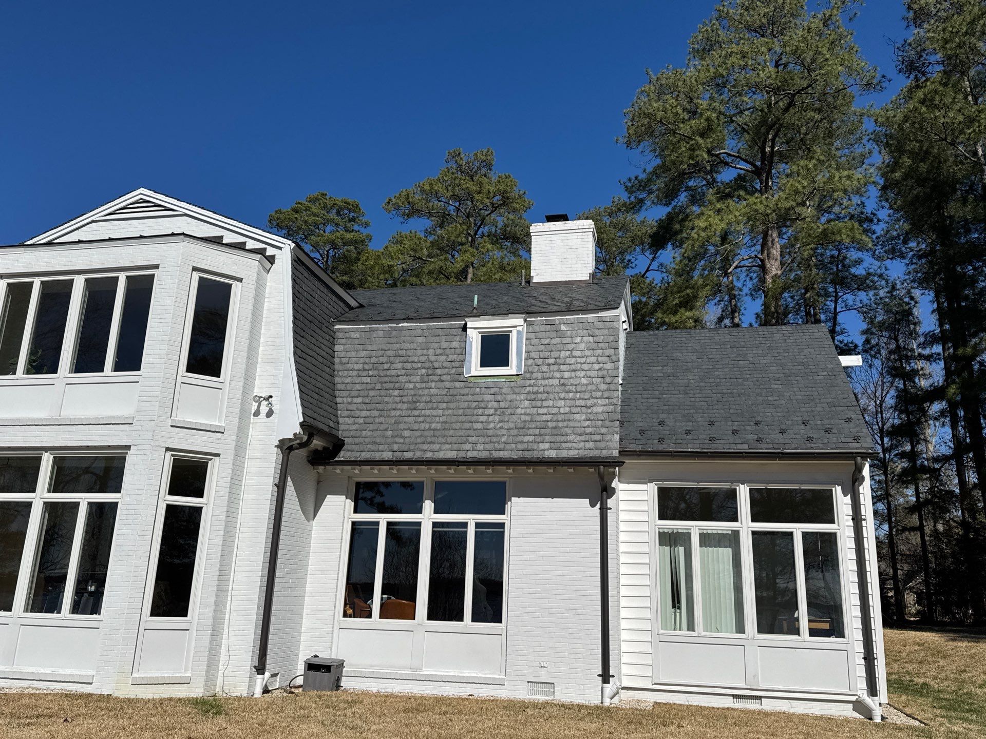 Historical Slate Roof Repair and Chimney Flashing Restoration in West Point by Cade Construction