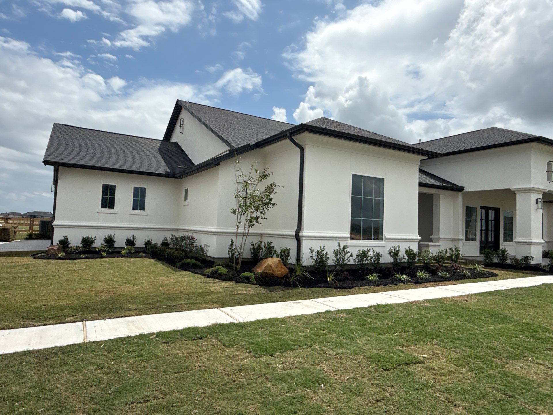 Custom Stucco Masterpiece with Precision Foam Detailing – Waller, TX by Apex Conventional Stucco Llc