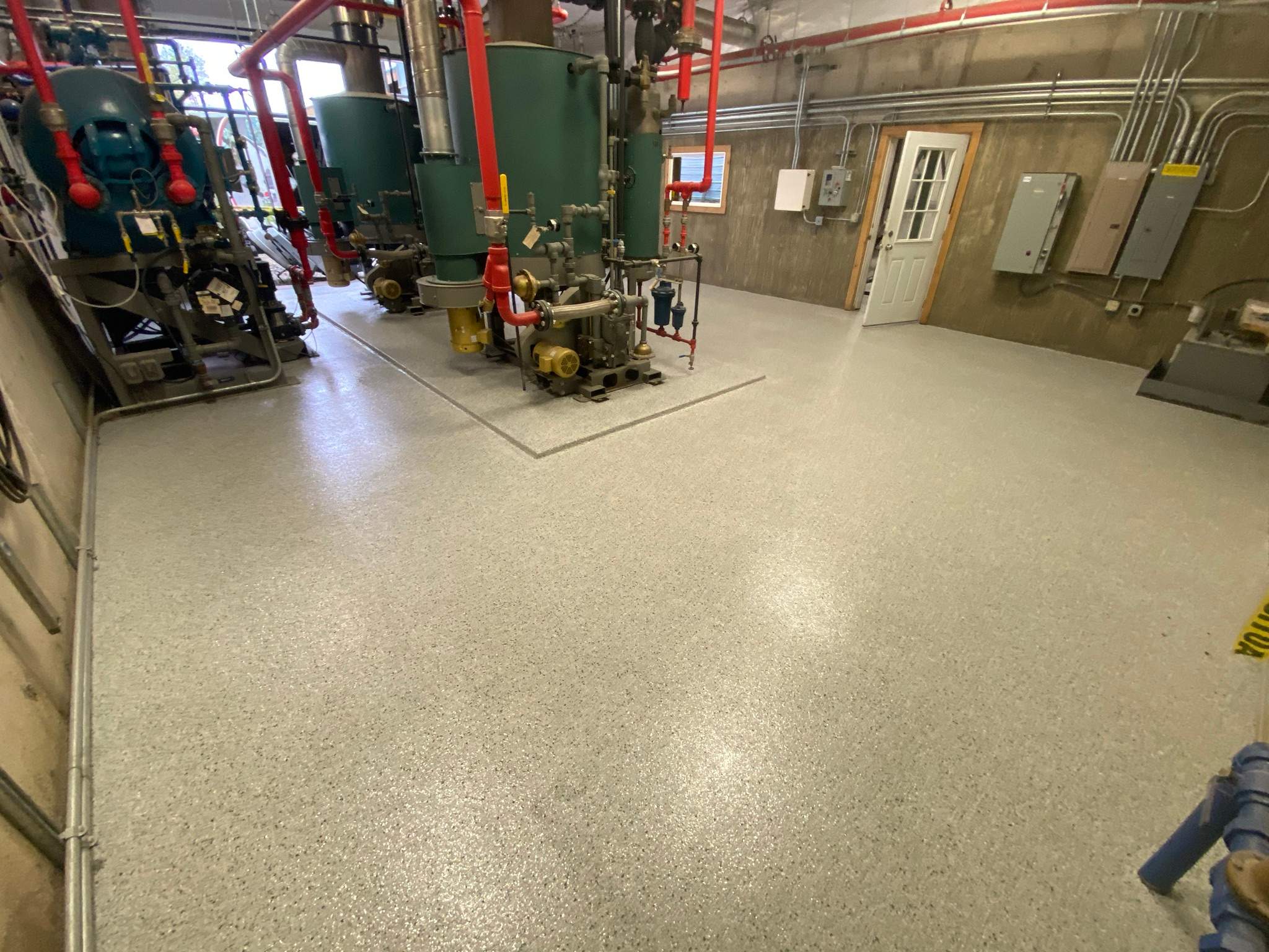 Commercial Floor Transformation using North Pole with Green by Croc Coatings, LLC