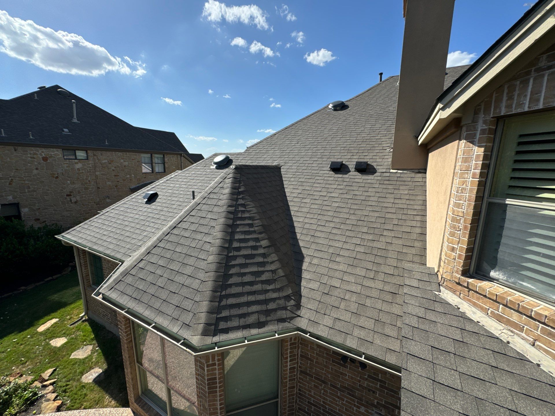 Residential Roofing Installation using IKO, Cambridge in Weathered Wood by Oakwood Roofing and Construction, LLC