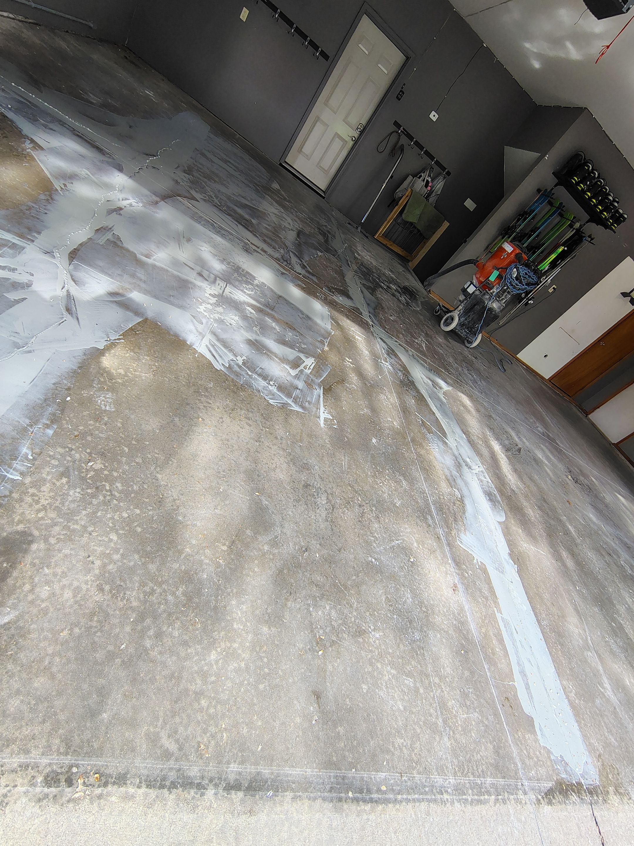 Garage Floor Concrete Coating and Crack Repair in Sioux Falls by Select Painting, Coatings & Garage Cabinets