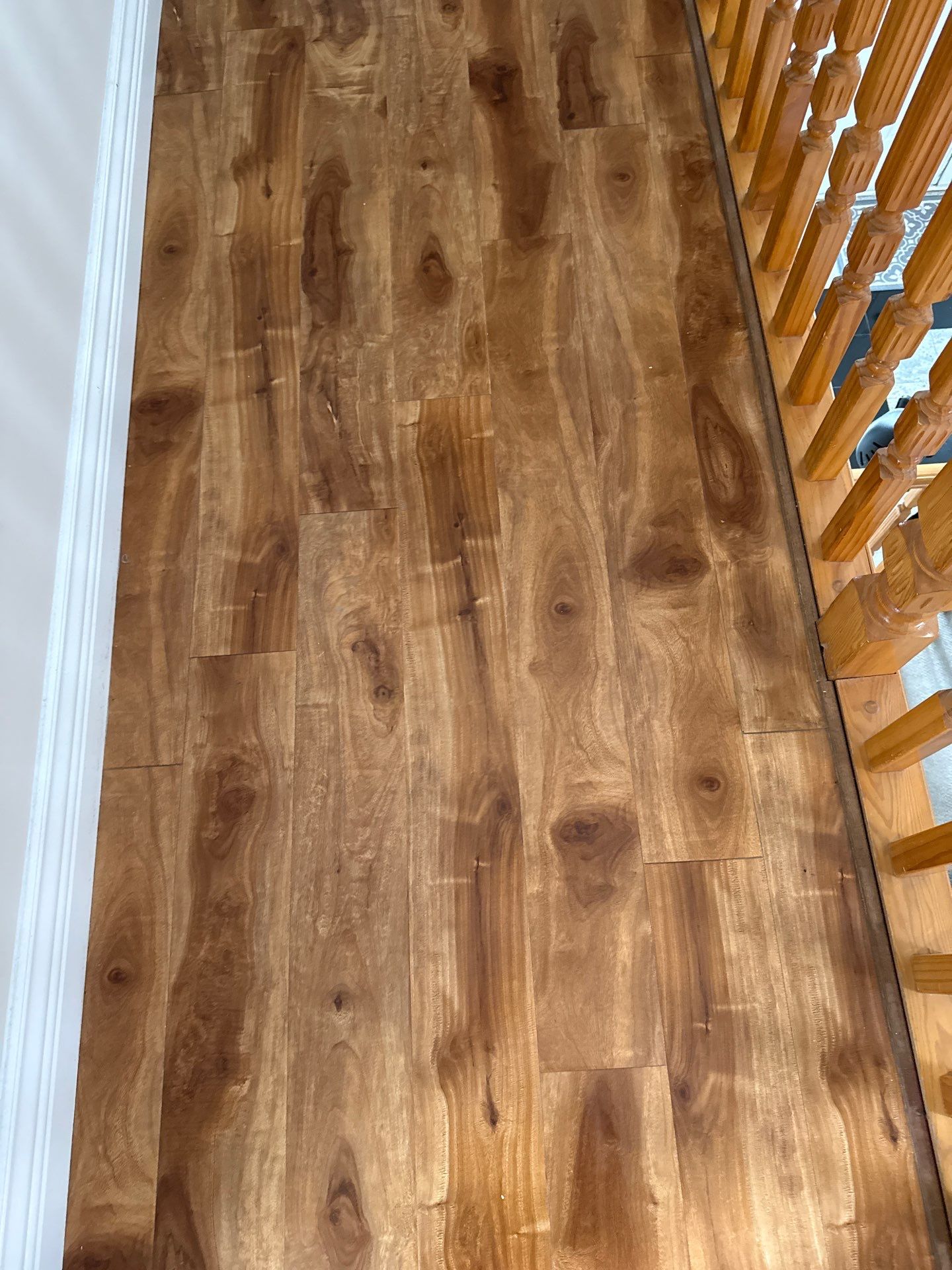 Interior Renovation Featuring Wood-Look Flooring in Richmond by Lyon Homes Ltd.