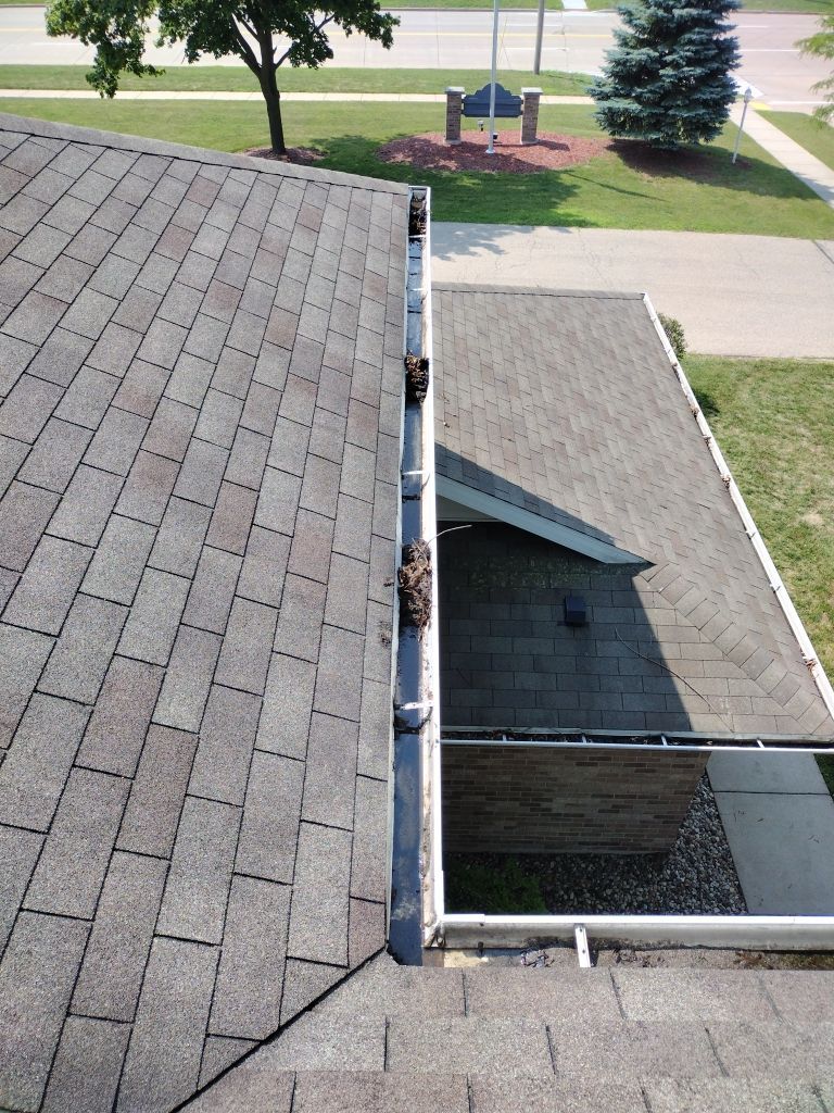 HOA gutter cleaning before photo.
