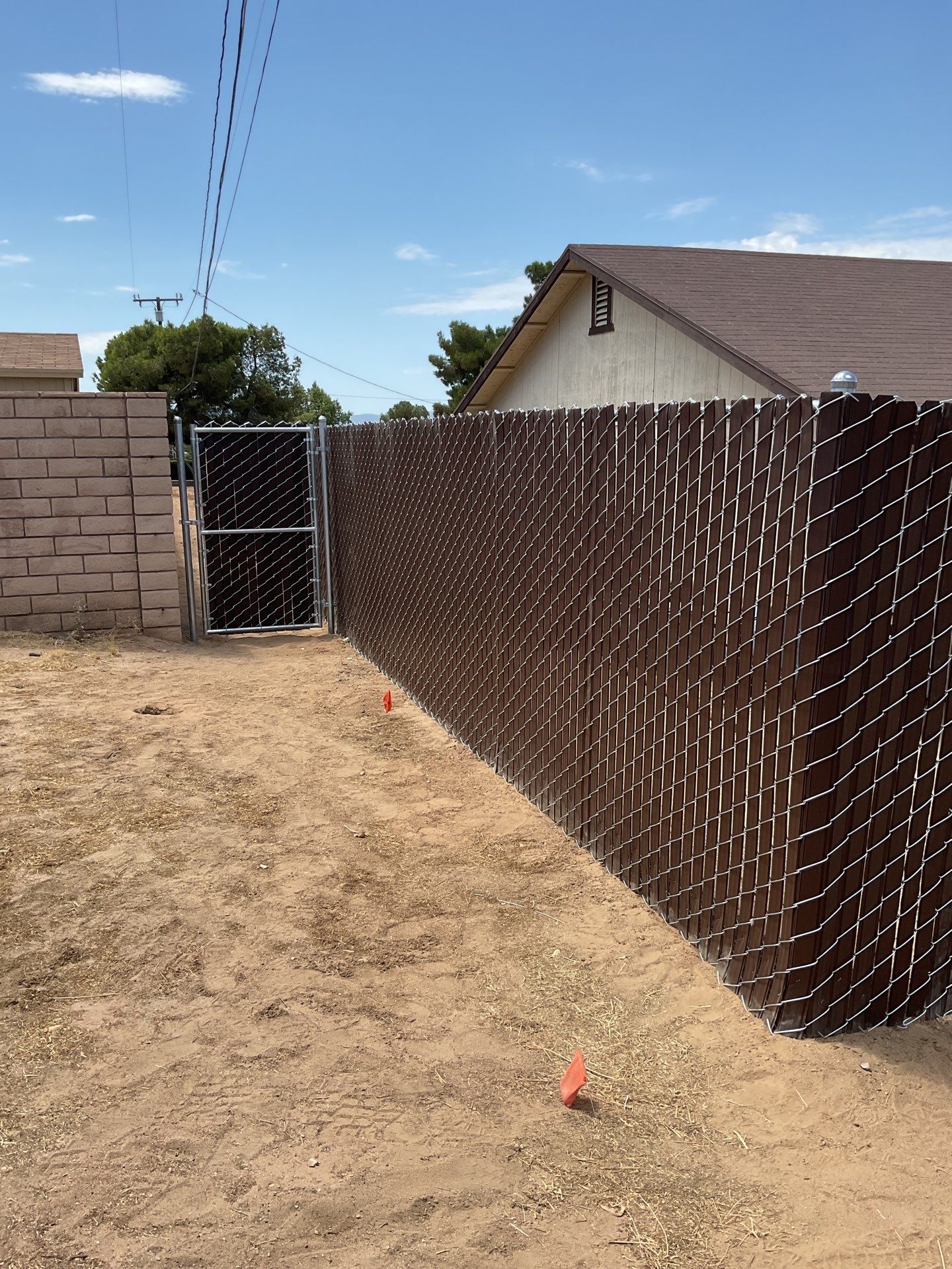 Dark Brown Privacy Chain Link Fence by Fence Guys Inc.